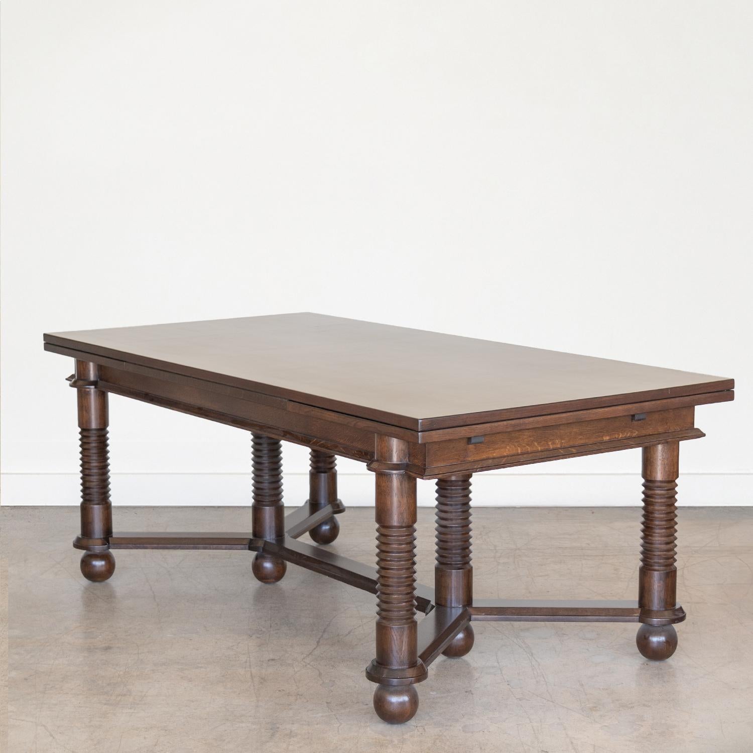 French Oak Extendable Dining Table by Charles Dudouyt In Good Condition In Los Angeles, CA