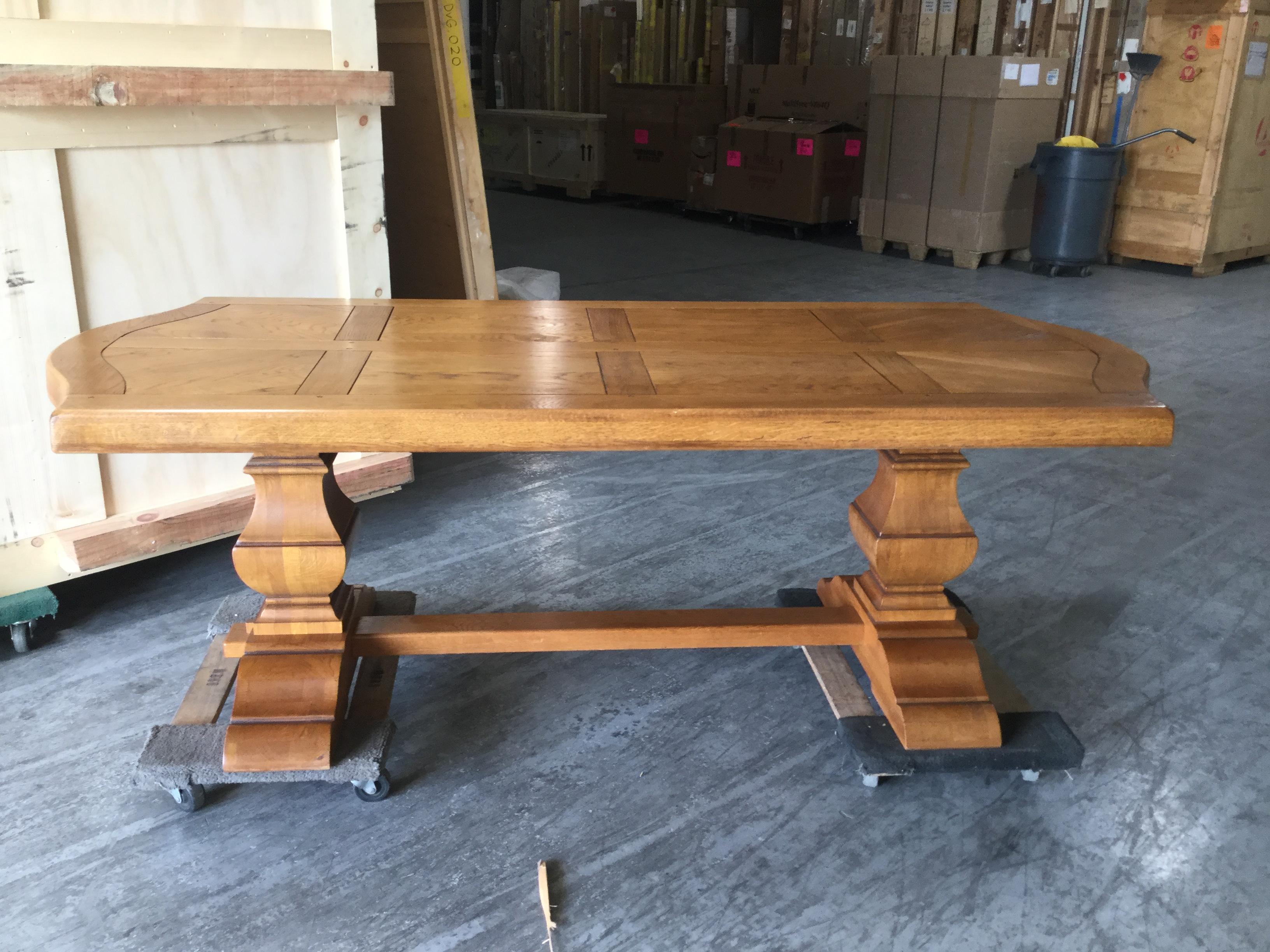 Handsome French oak dining table with a parquet top that is 3