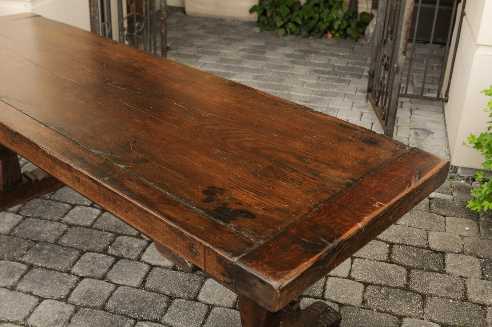 Rustic French Oak Farm Table with Trestle Base and Weathered Patina, circa 1880