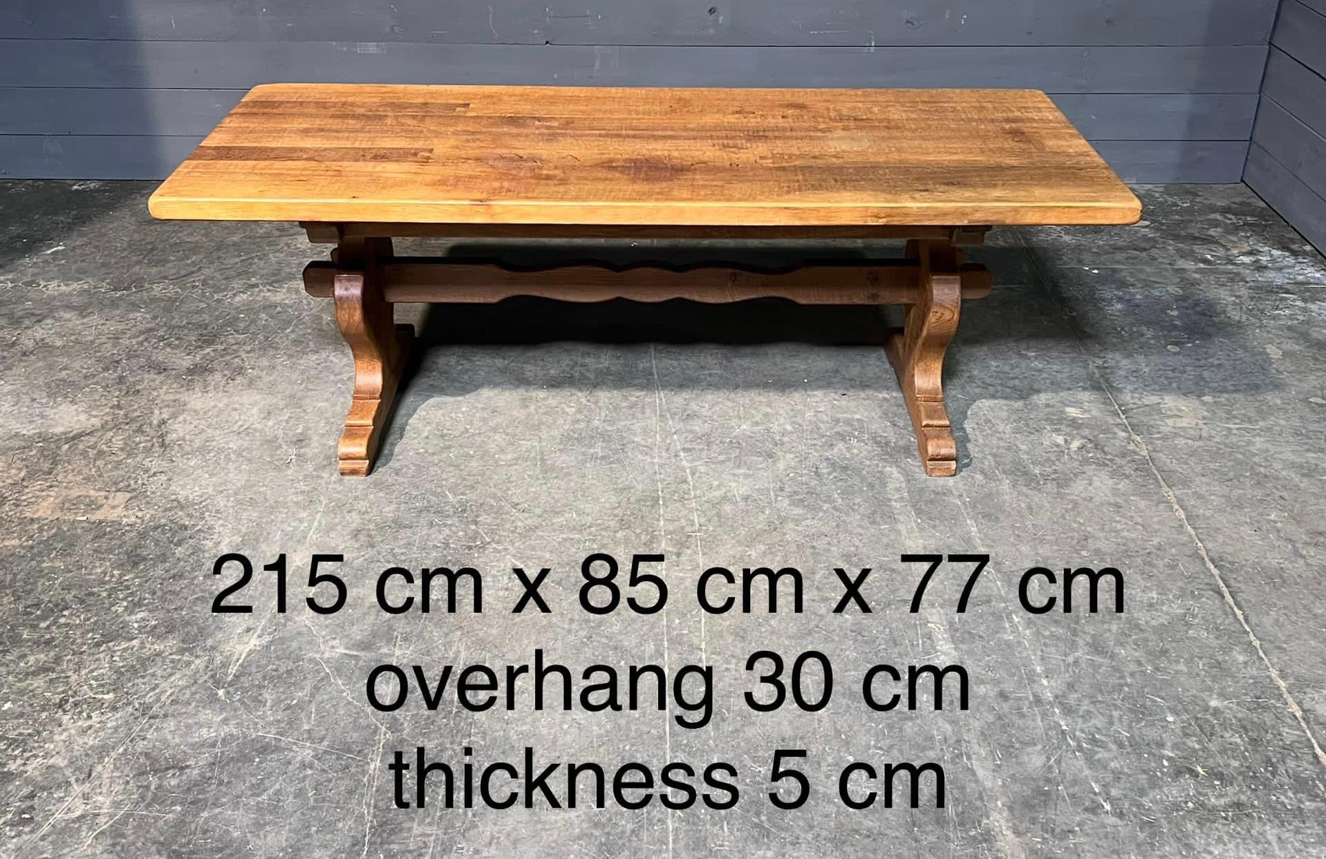 A lighter original colour French solid oak farmhouse refectory dining table. Dating to the early 1900s and of excellent quality construction. The table comes apart for easy access into the home. Having its original light Oak colour and a nice patina