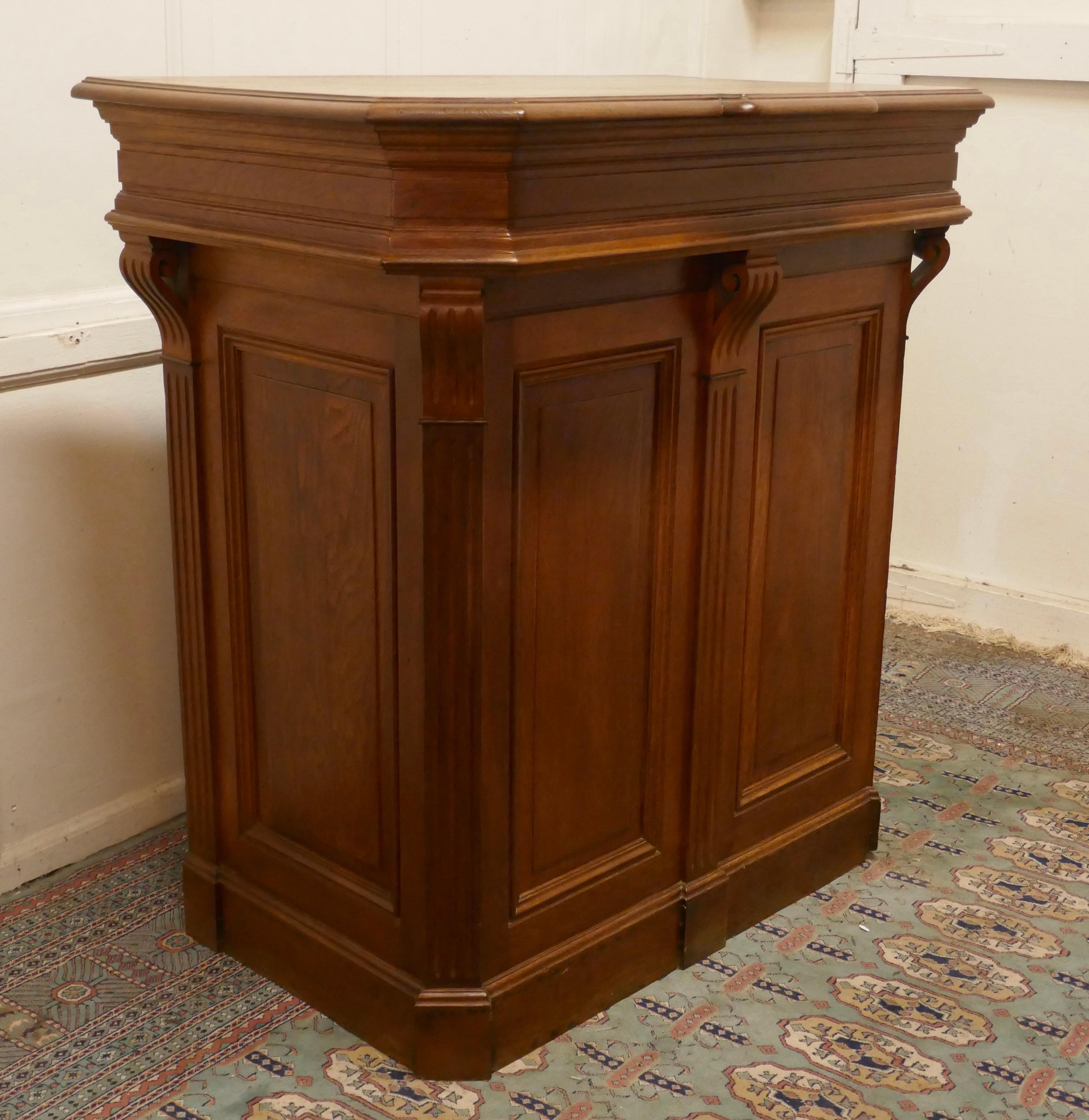 French oak hotel restaurant reception hostess greeting station, Greeter

An Original French Front of House Oak Greeter, the front and sides of the desk are panelled, 
At the reception side there is storage, some for tall Menus, a shelved