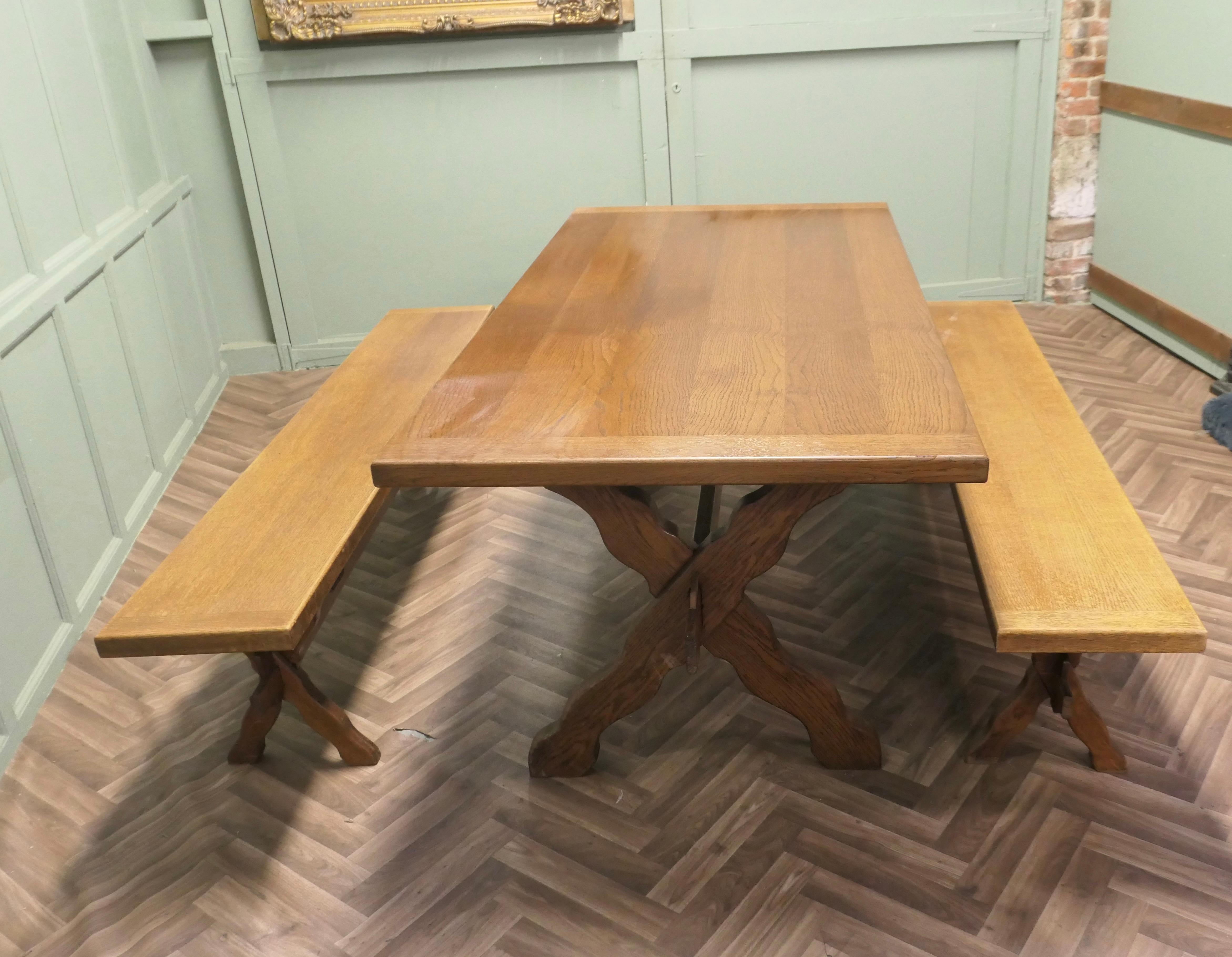 French Oak Refectory Table and Benches

This is a very Heavy Set of French Oak Country Furniture, a refectory table from Brittany with original matching benches
This is a very heavy table, the table has a 2” thick Oak top 
The table is a typically