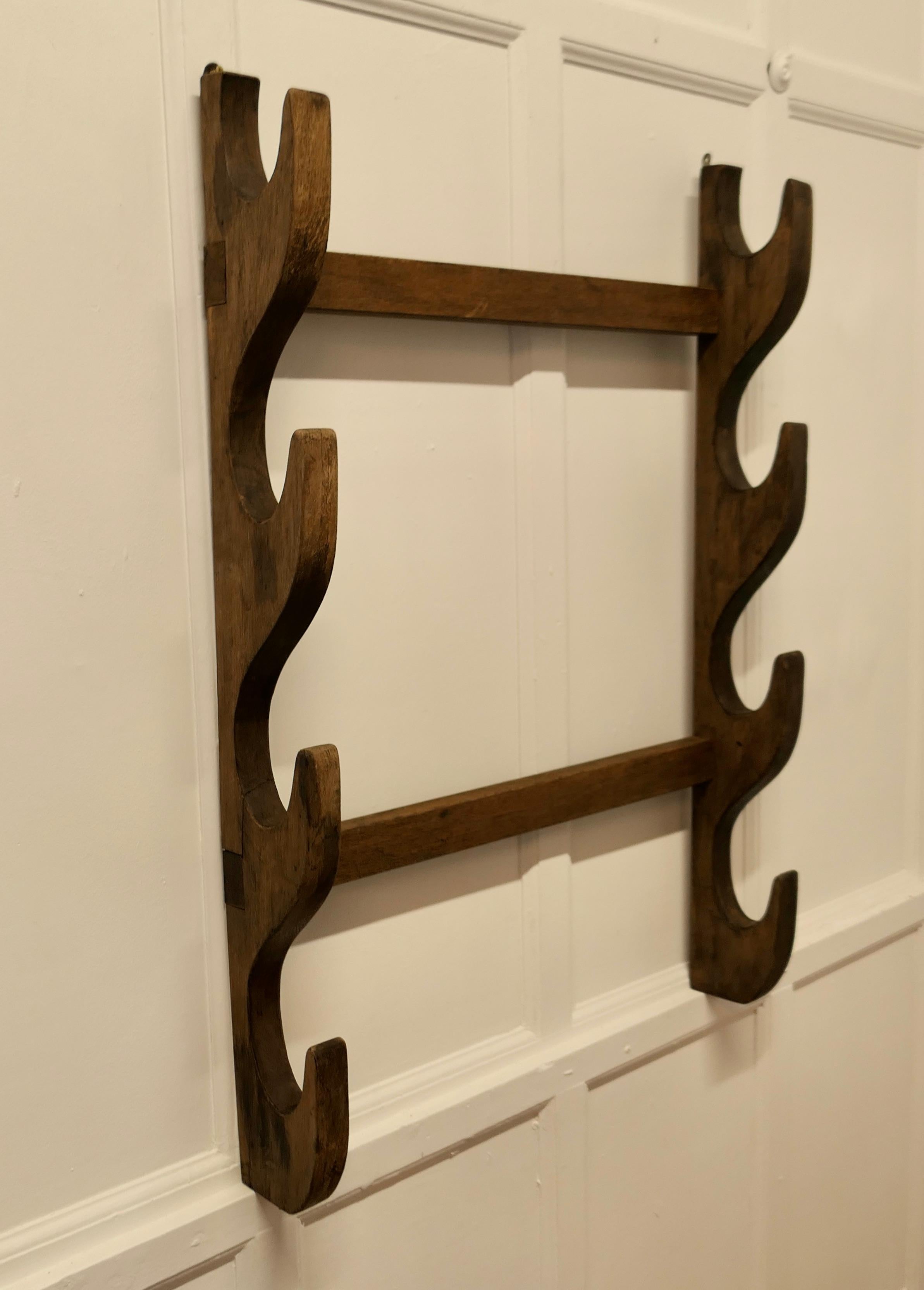 French Oak Spit Rack Holder for Roasting Jacks

This is a chunky country piece, it is made in 2” thick solid Oak and will hold 4 Spits

The Rack is in very good condition, it is 30” long, 40” high and 6” deep 
MS114.