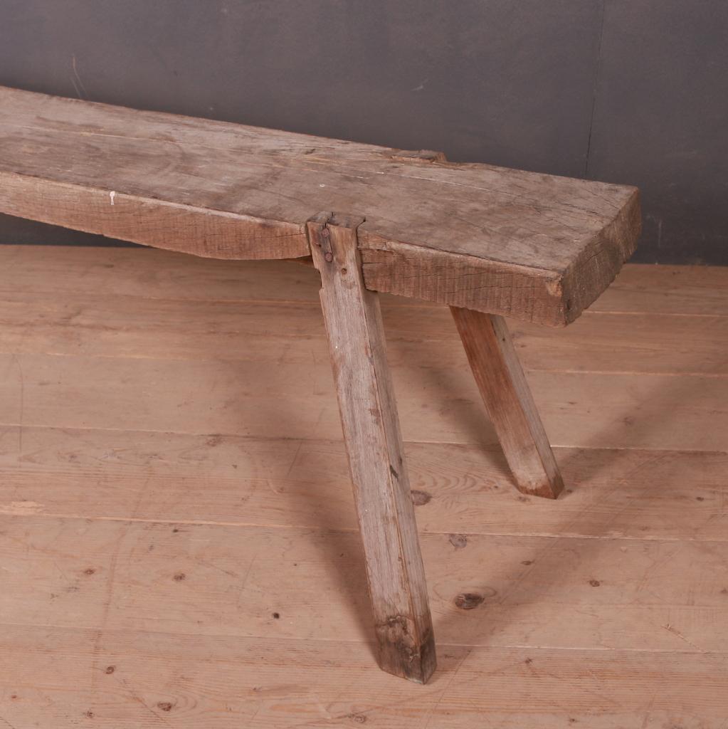 Rustic French oak trestle bench. 1890.

Seat depth - 10.5