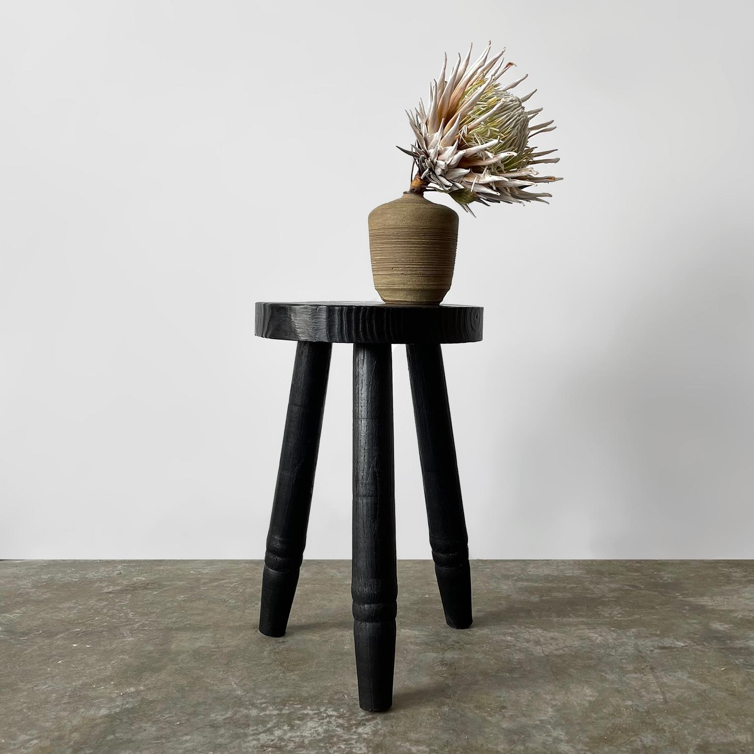 French oak tripod stool
France, mid century
We believe this stool was hand crafted by someone with a deep appreciation and love for wood
Wonderful textured grain detail which has been preserved through the construction process
Black noir finish with