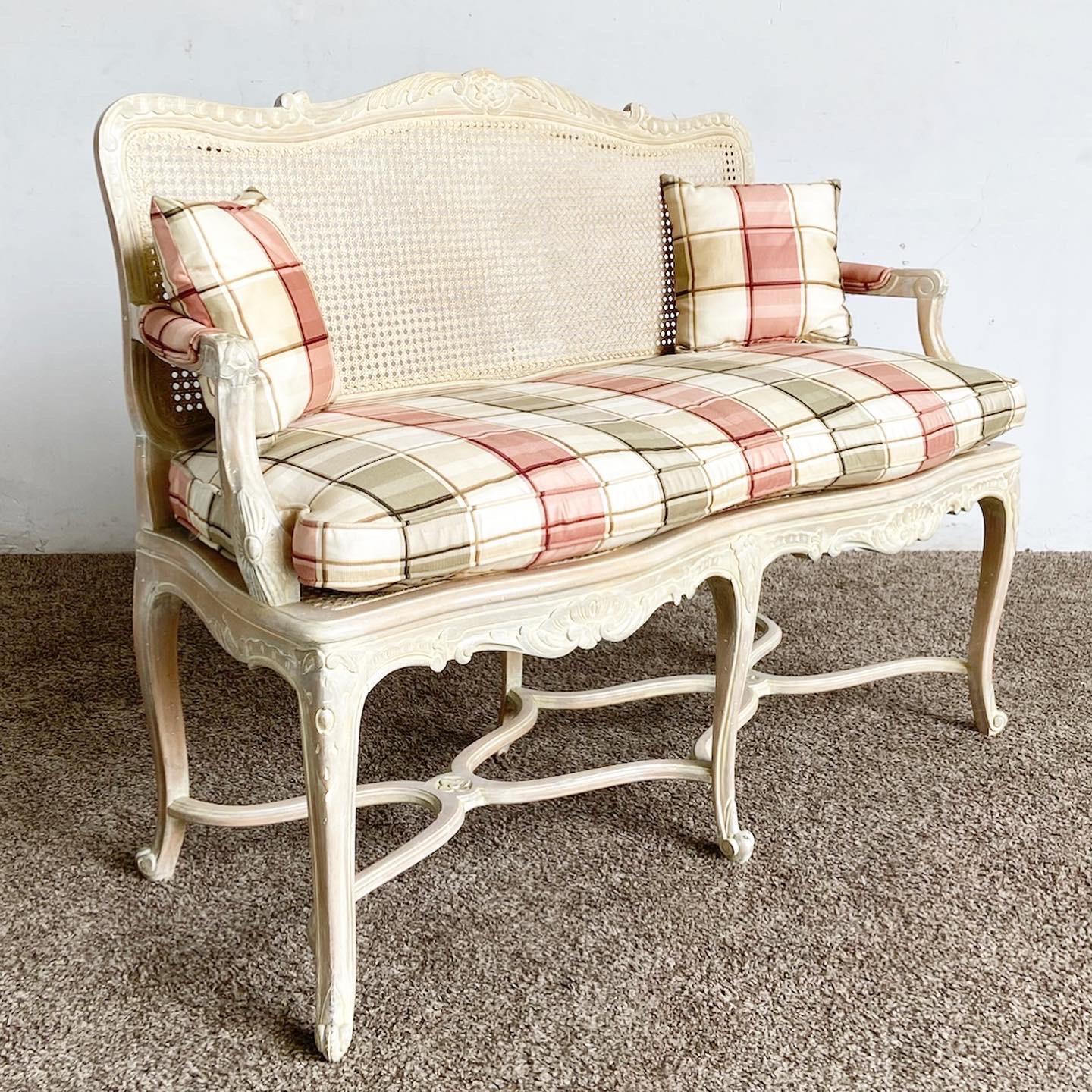 Embrace elegance with our French Style Off White Cane Back Bench/Settee, a blend of traditional French design and sophisticated style for any home setting.

Crafted in the style of traditional French design with a beautiful cane back