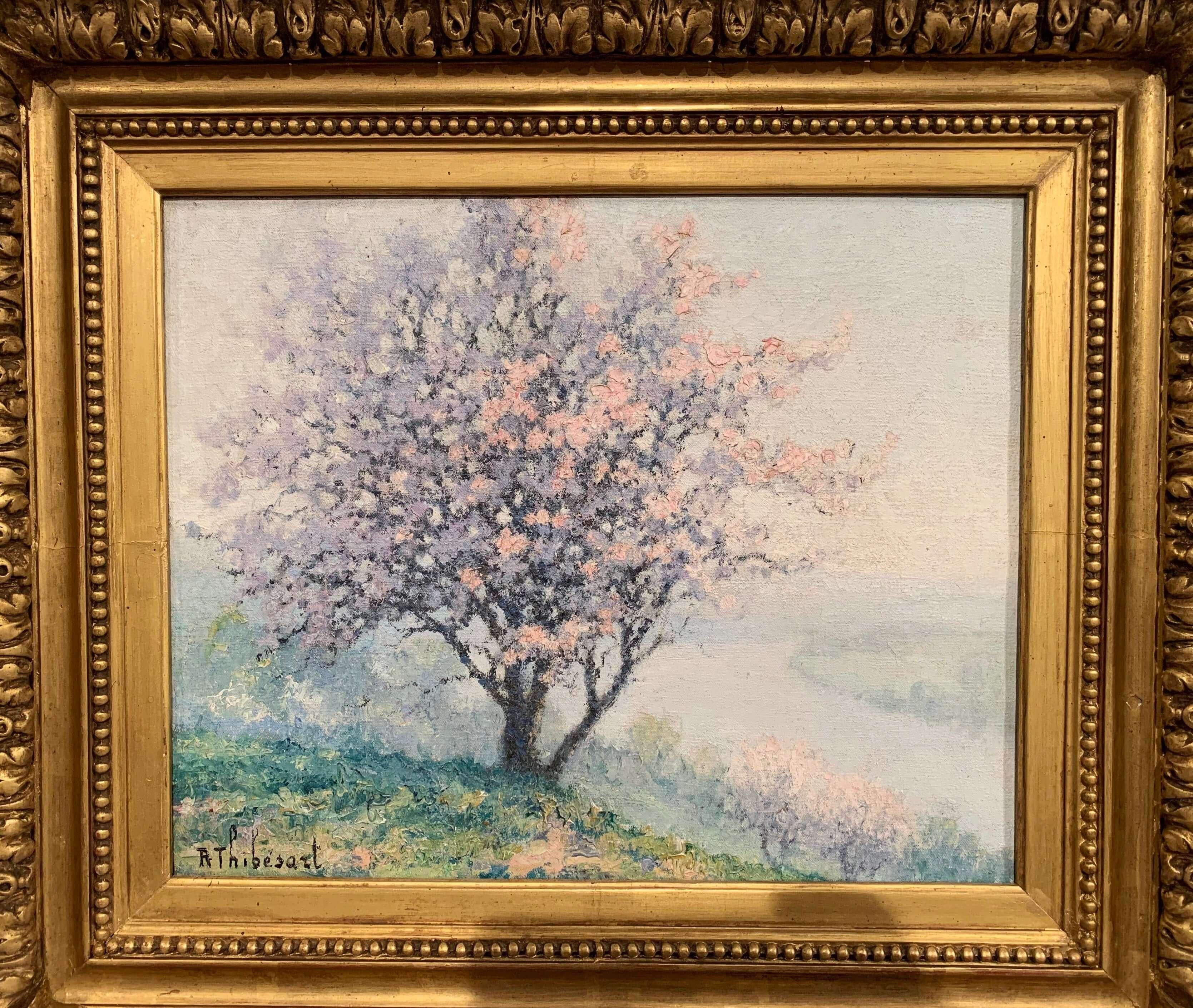 Insérée dans un cadre sculpté et doré, cette huile sur toile intitulée 
