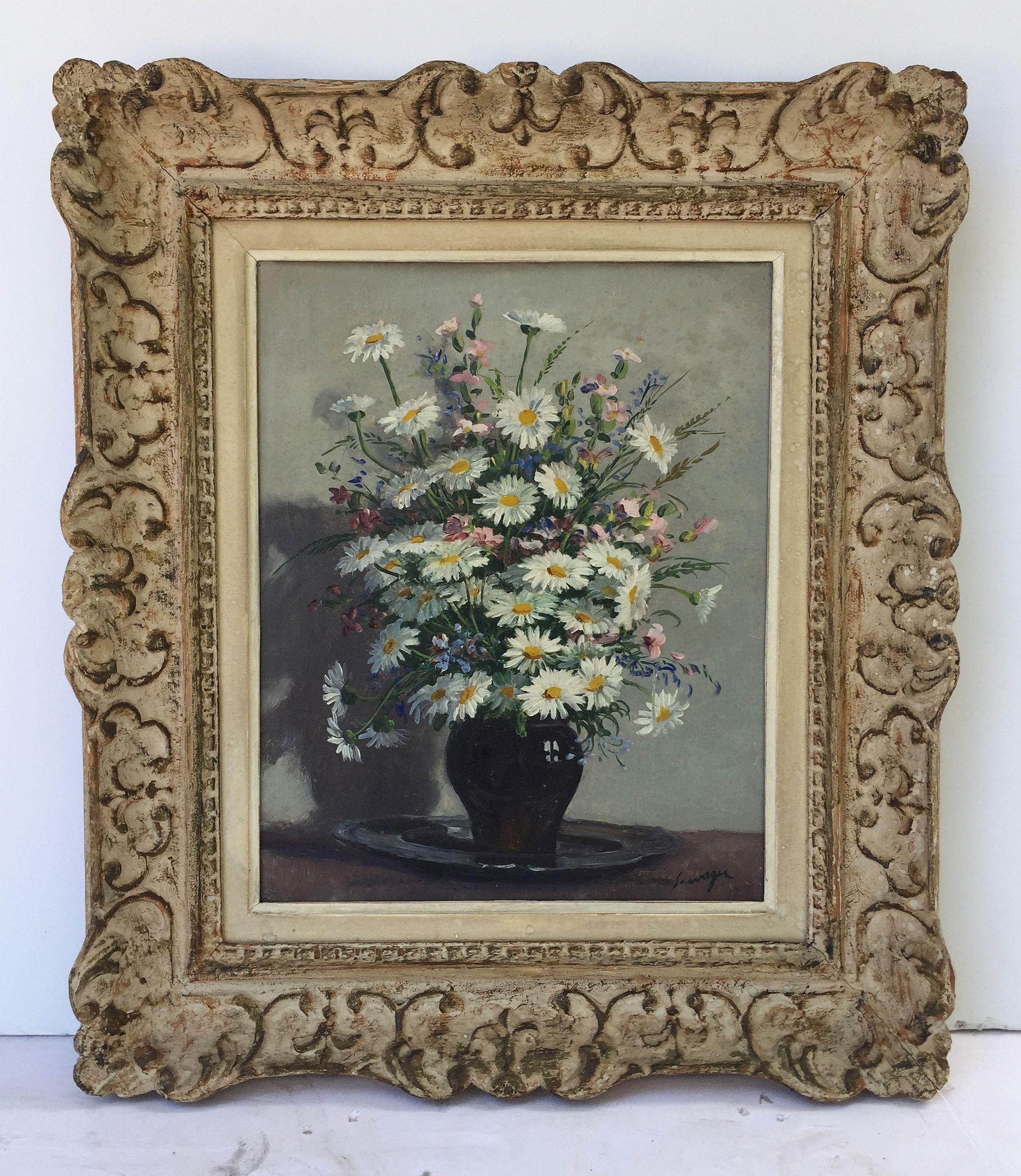 A fine French oil painting on canvas featuring a still life of a vase of flowers in a Montparnasse carved wooden frame.

The Montparnasse frame takes its name from the Parisian district where it was born, at the beginning of the 20th century.