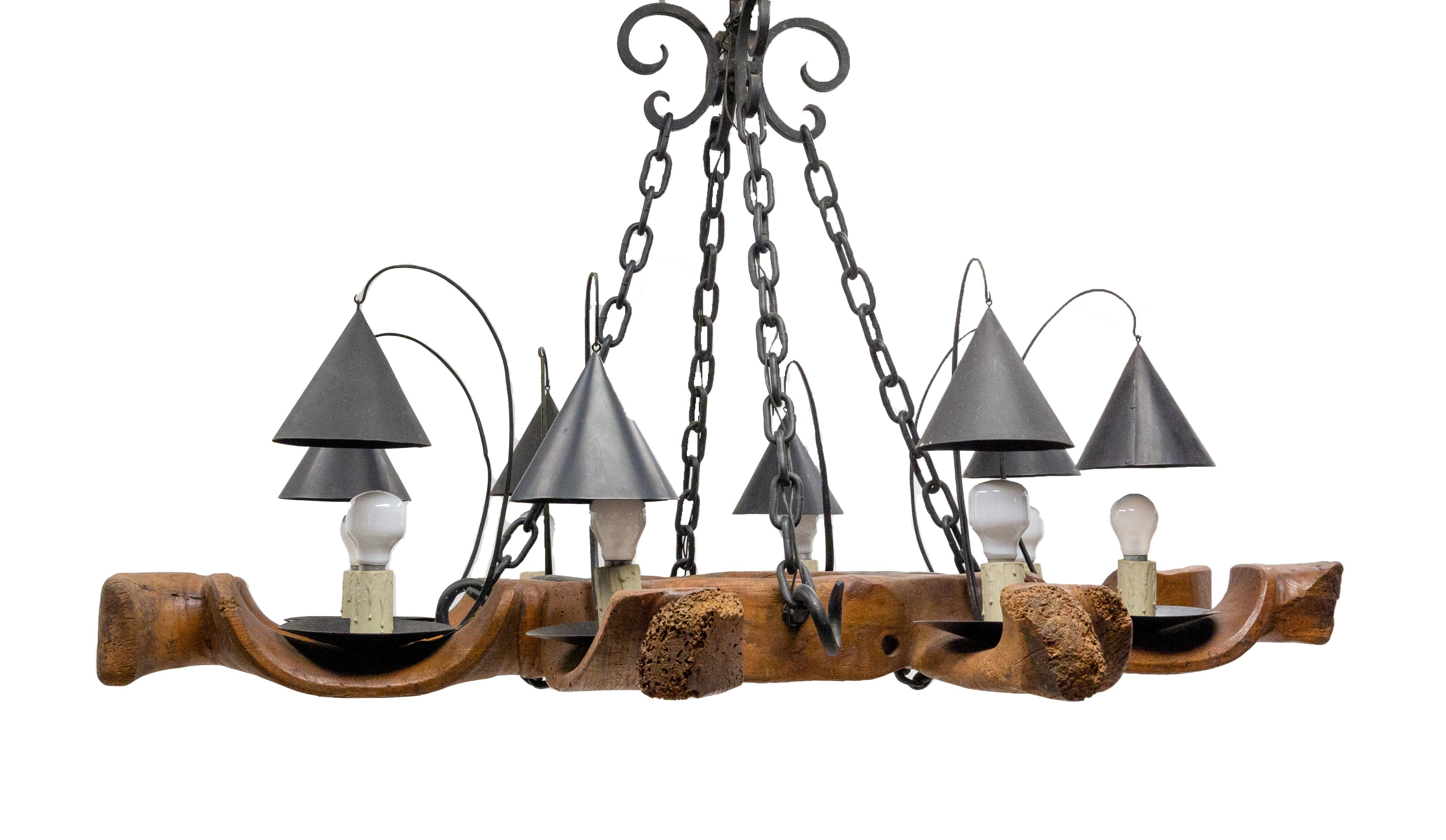 French chandelier composed with four ox yokes
Rare pendant light with eight lamps.
Each light is covered by a lampshade.
Wear consistent with age and use.
This can be rewired to USA or EU and UK standards please ask.
An additional matching chain