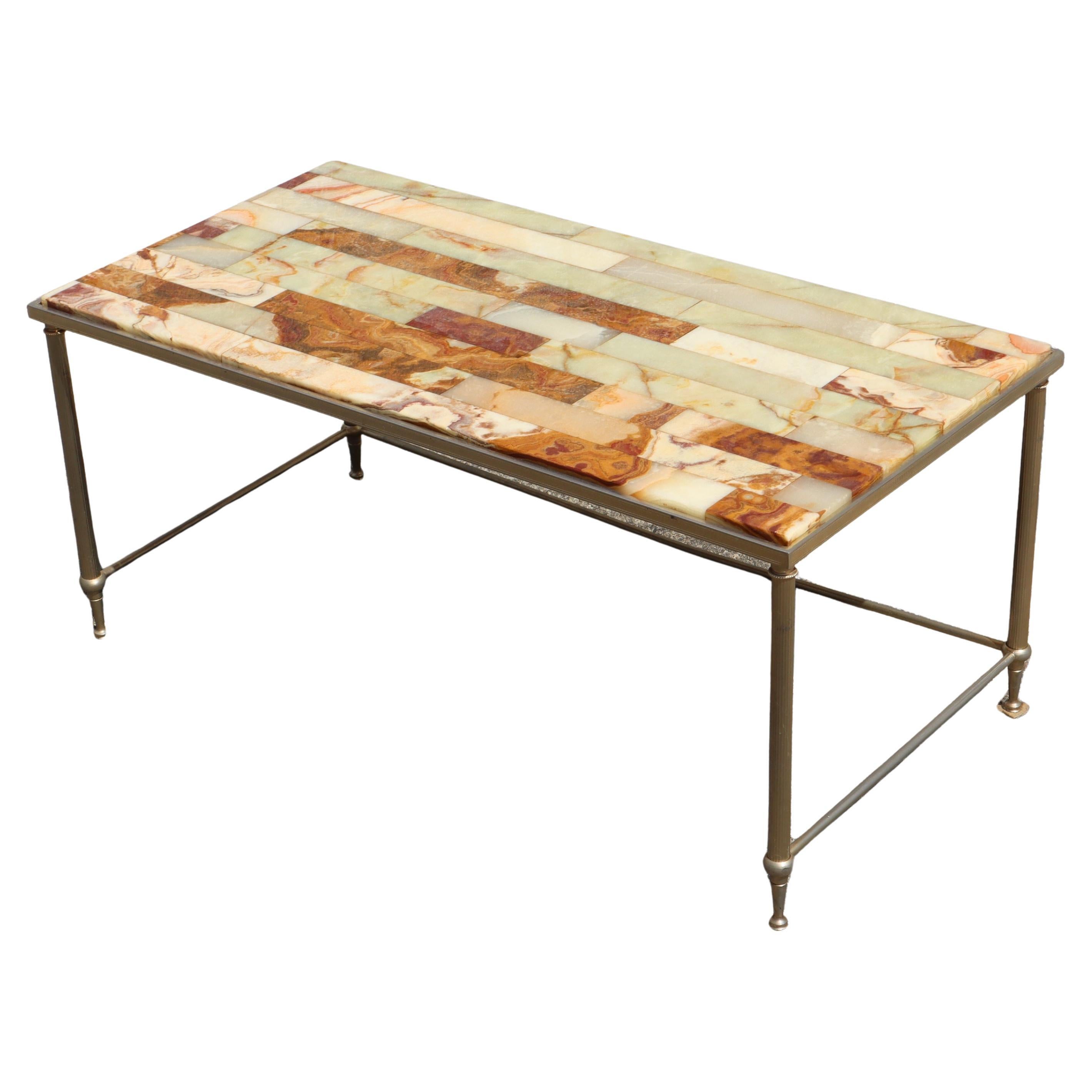 Elegant French Onyx and Brass Coffee Table -Lounge Table - Maison Jansen Style from the 70s 
The Tabletop feature a stunning mix of jade green, mother of pearl, orange and brown tones that are even more vibrant than shown in the photos.
The elegant