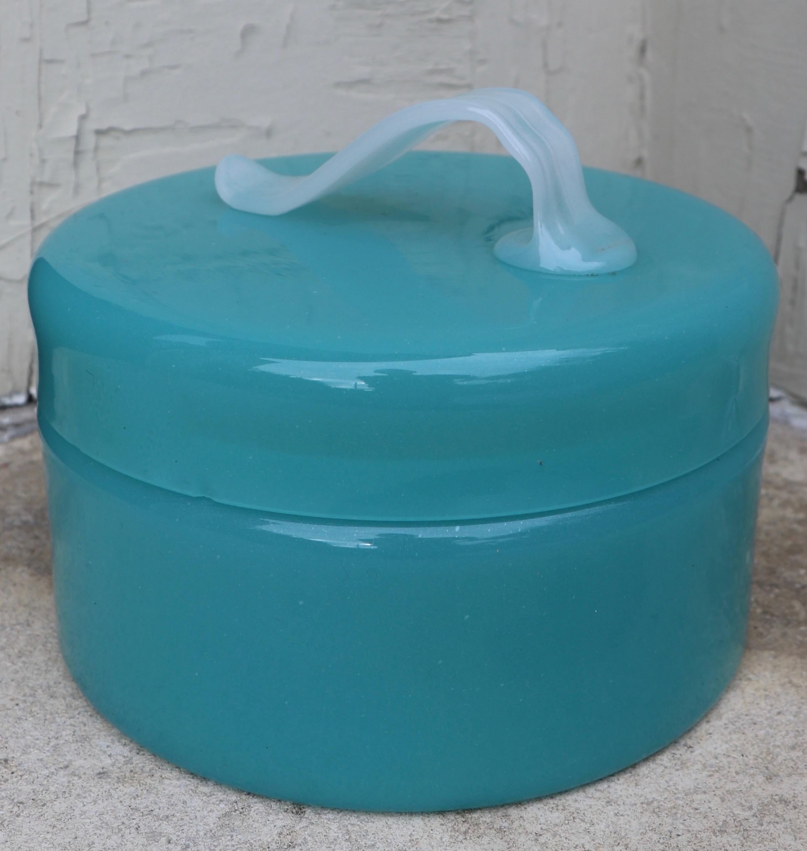 Elegant opaline glass covered box with applied clam broth glass leaf handle. We believe the box is French in origin, it is in very good, original condition showing only a couple of inconsequential flakes to the glass along the rim. Suitable for use