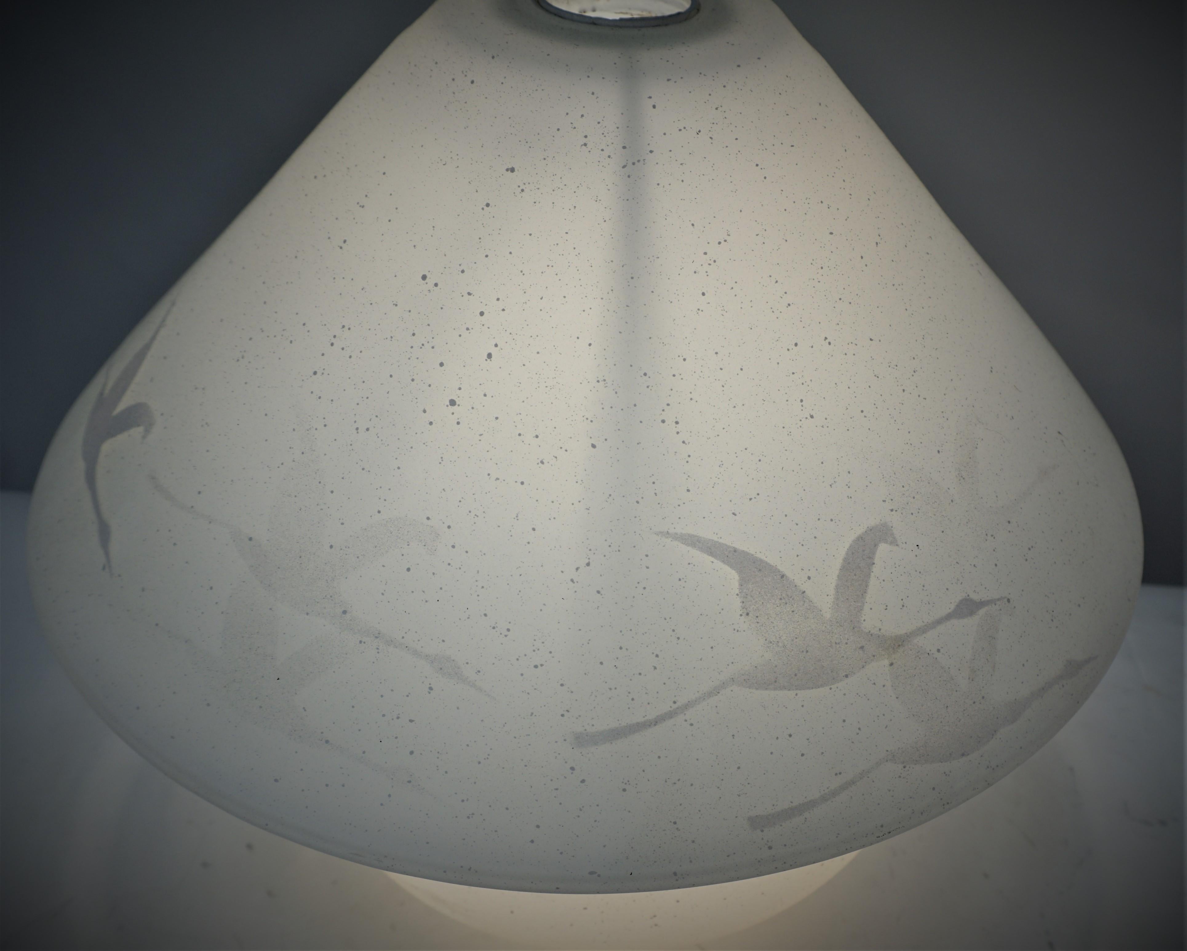 Mushroom lamp, white enamel painting, flying geese over white opaline glass with light at top and base.