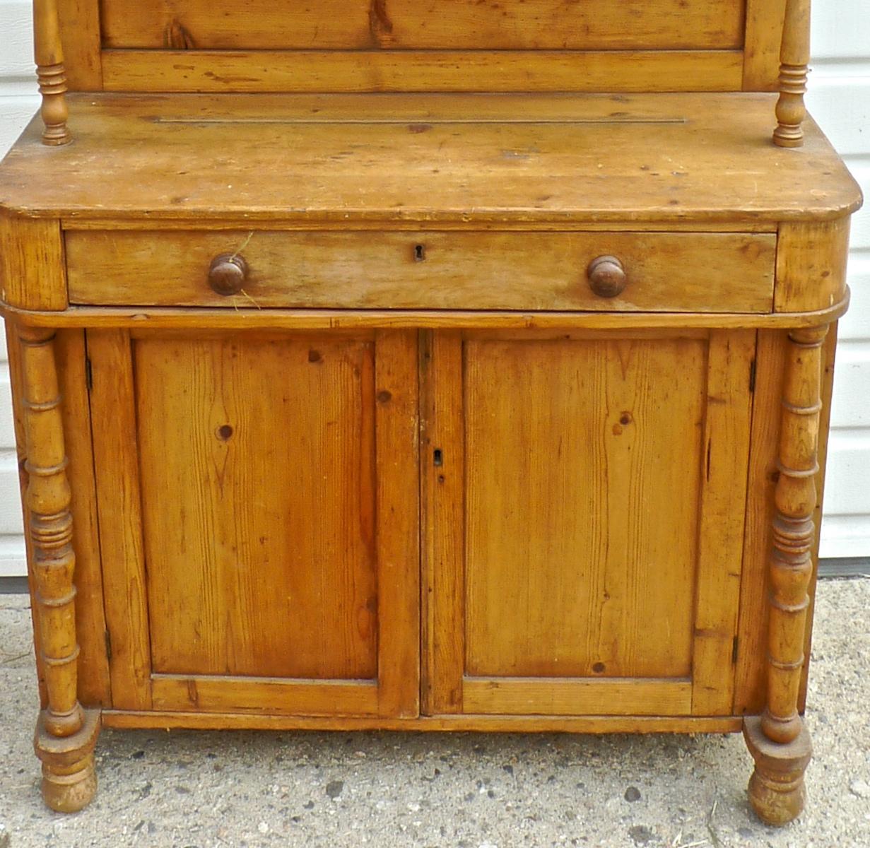 dresser with open shelves and drawers