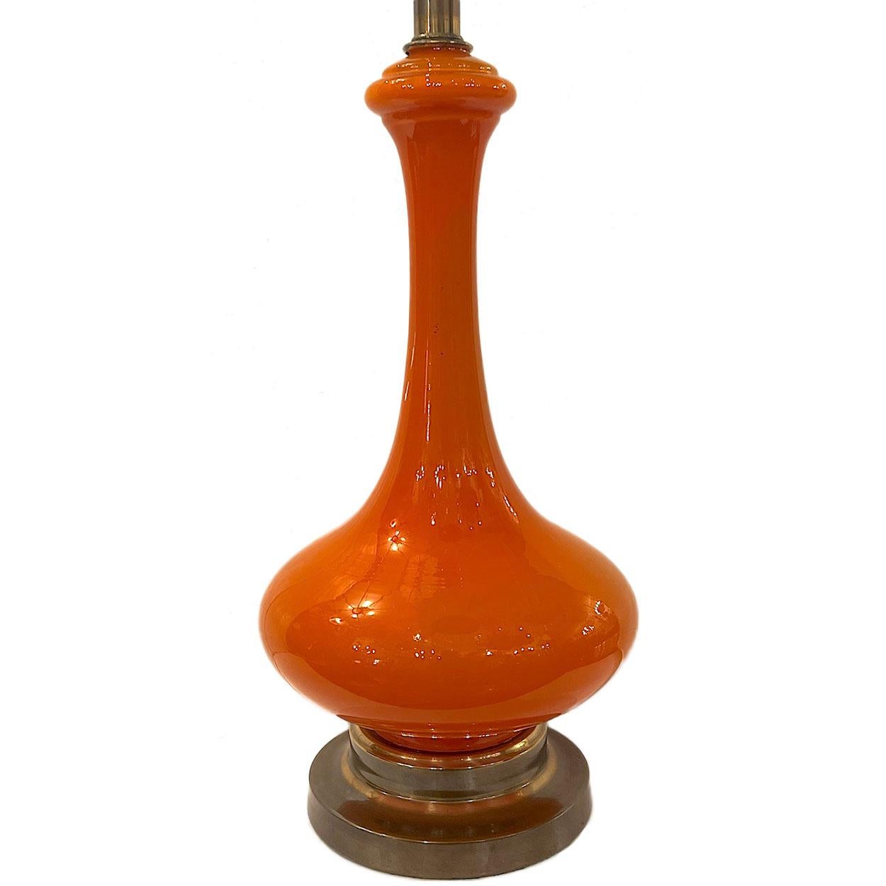 A circa 1960's French molded glass table lamp.

Measurements:
Height of body: 18