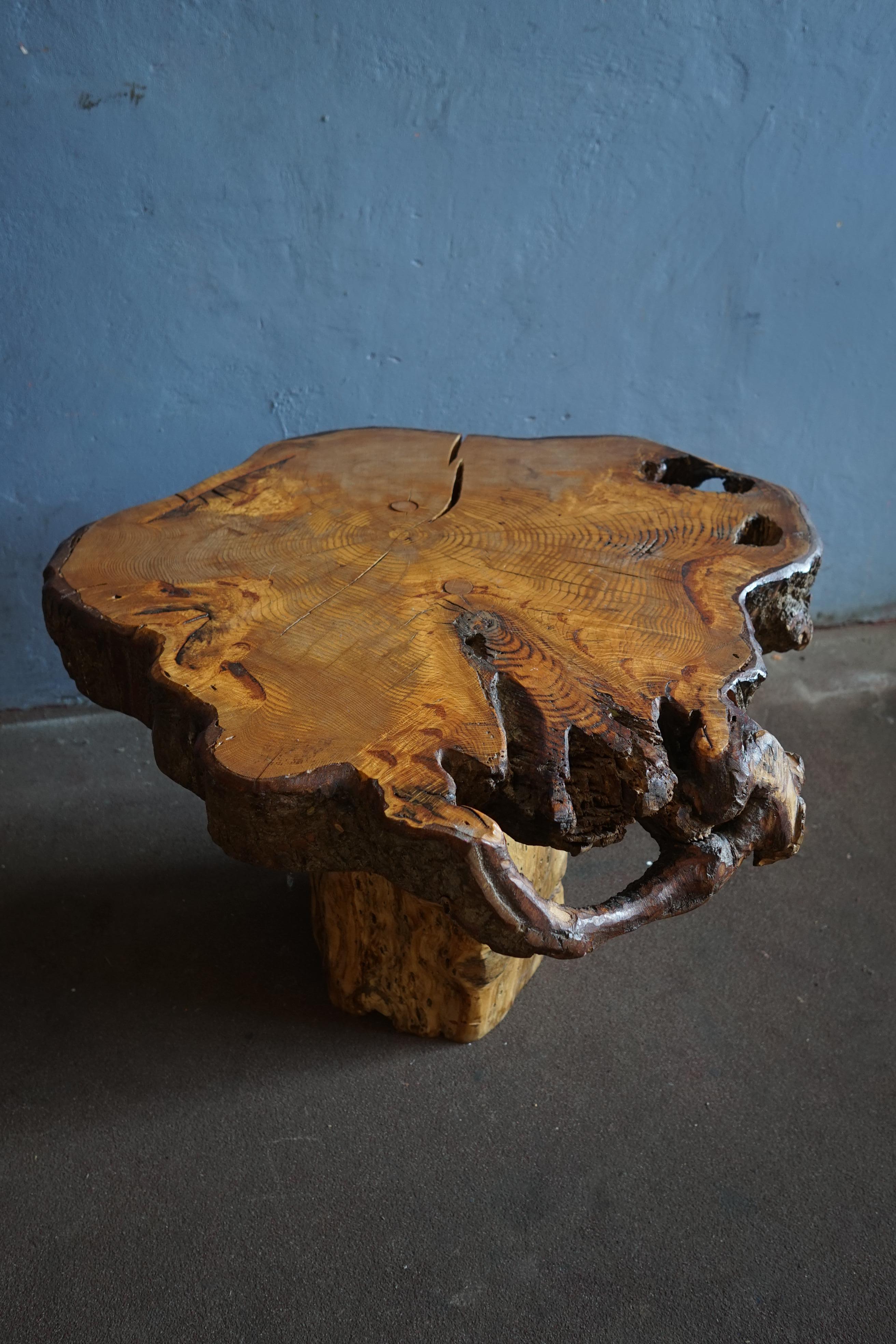 Rare and possibly unique coffee table made by a very talented french craftsman in France in the 1950's.
The table has beautiful visible joints on the table top, the table has great organic shape and look to it which gives it a delicate look while