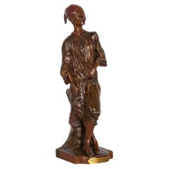 Sculpture orientaliste française en bronze ancien d'Edouard Drouot d'un garçon de Shoeshine