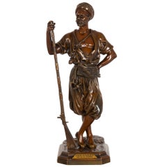 Sculpture orientaliste française en bronze ancien représentant un guerrier avec une muette par Debut