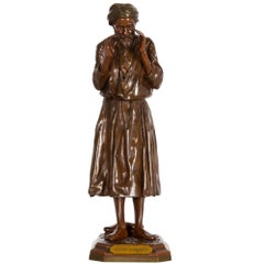 Scultura orientalista francese in bronzo con uomo arabo in preghiera di Antoine Bofill