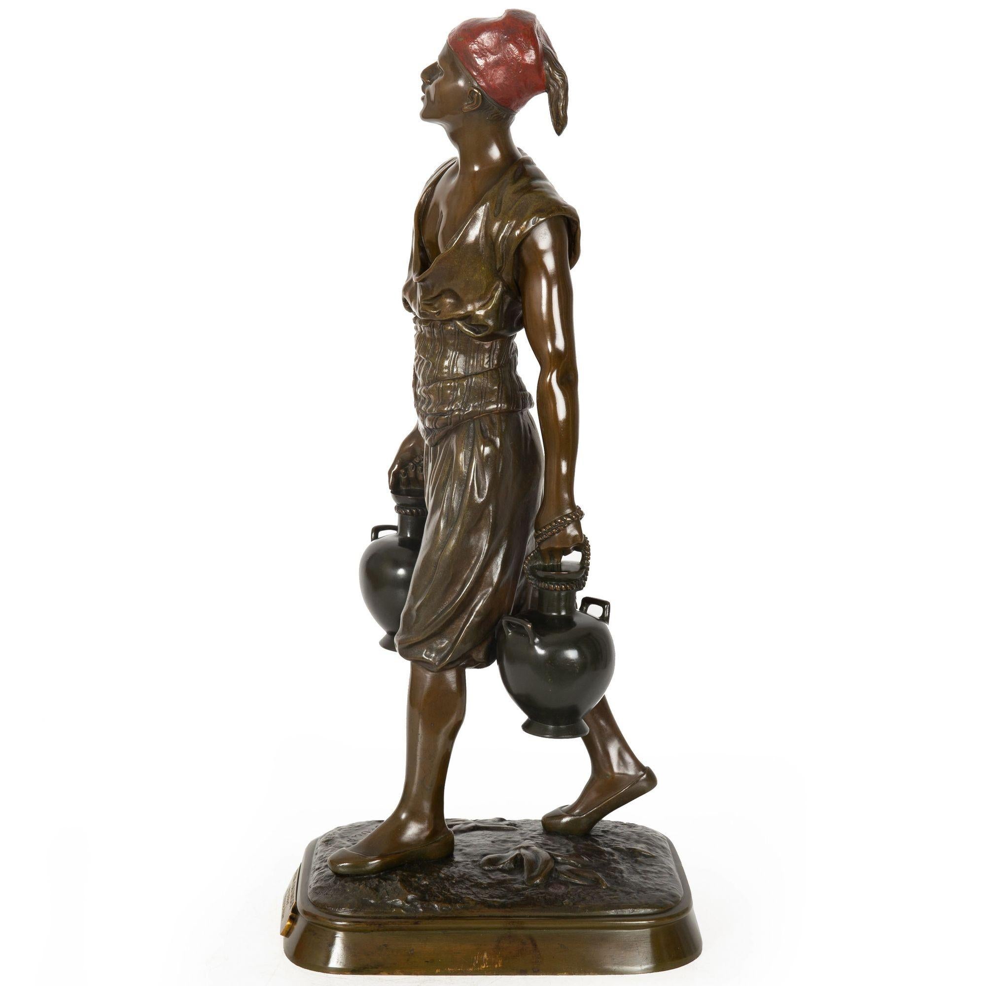 Patinated French Orientalist Bronze Sculpture of Tunisian Water Carrier by Marcel Debut For Sale
