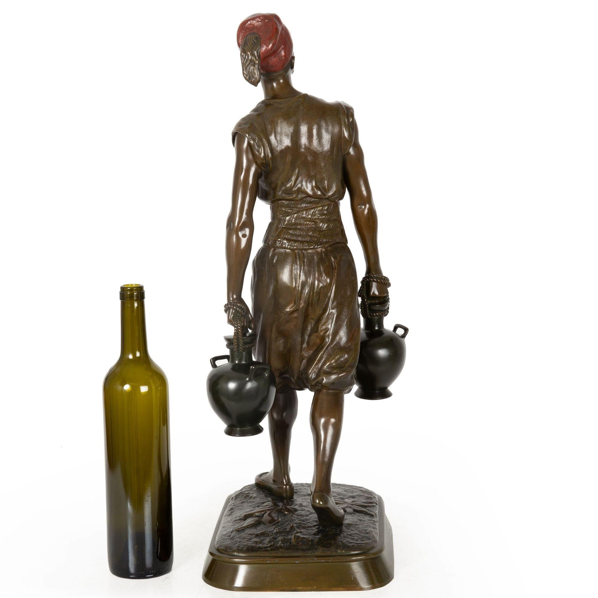 20th Century French Orientalist Bronze Sculpture of Tunisian Water Carrier by Marcel Debut For Sale