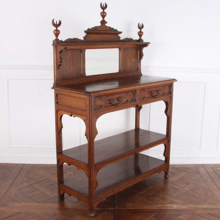 A French carved oak server in an exotic ‘Orientalist’ style, with Middle Eastern or North African stylistic influence.







    
