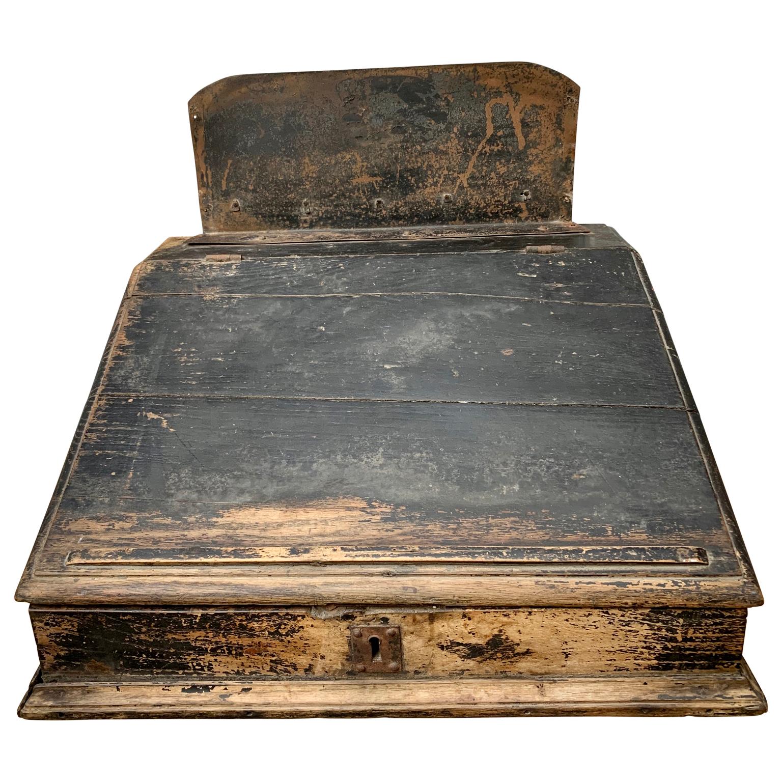 An original black painted portable desk from the end of the 18th century. With owner initials, the desk has a French hand-written address on the inside. Desk is with the original paint and patina.