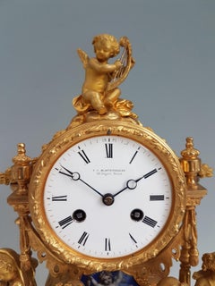 French Ormolu and Blue Porcelain Four Seasons Mantel Clock