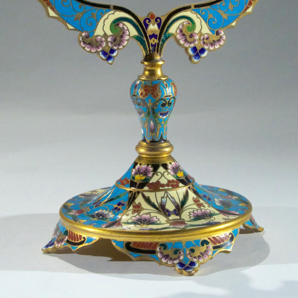 A French Ormolu and Champlevé Enamel oval dressing table mirror. The champleve enamel oval dressing table mirror with beautiful intricate detail.

Date: 19th century
Origin: French
Dimension: 10 1/4 x 7 1/2 inches.