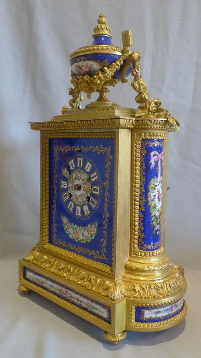 Porcelain French ormolu and hand painted porcelain on a cobalt blue ground For Sale