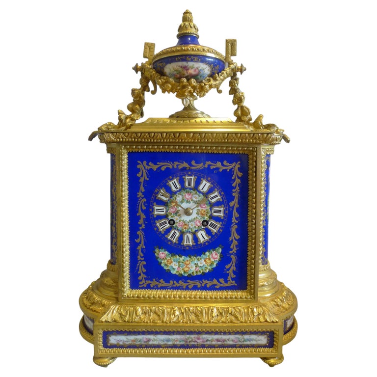 French ormolu and hand painted porcelain on a cobalt blue ground For Sale