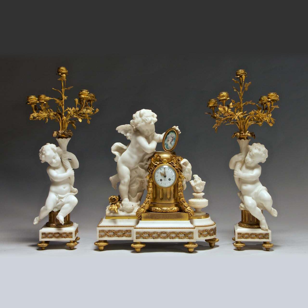 Fine and important French ormolu and marble cherubs clock garniture
Comprising a clock and a pair of five-light candelabra.

 
 
Origin: French
 
Date: 19th century
 
Dimension: The clock 20 1/2 in. high, 18 1/2 in. wide, 8 1/2 in. deep,