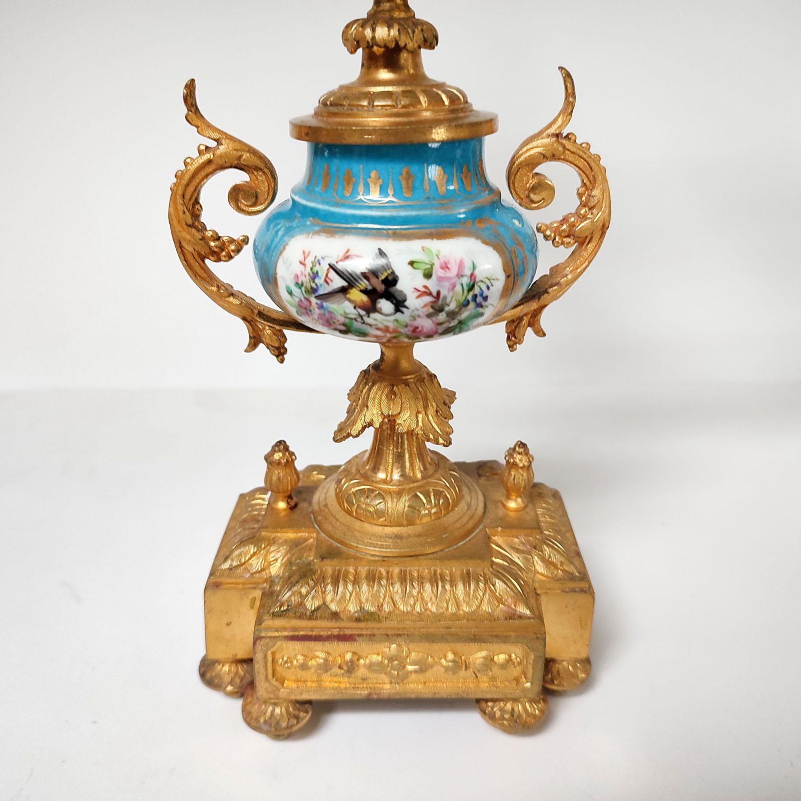 French Ormolu and Porcelain Mantle Clock and Pair of Candelabra, 19th Century 7
