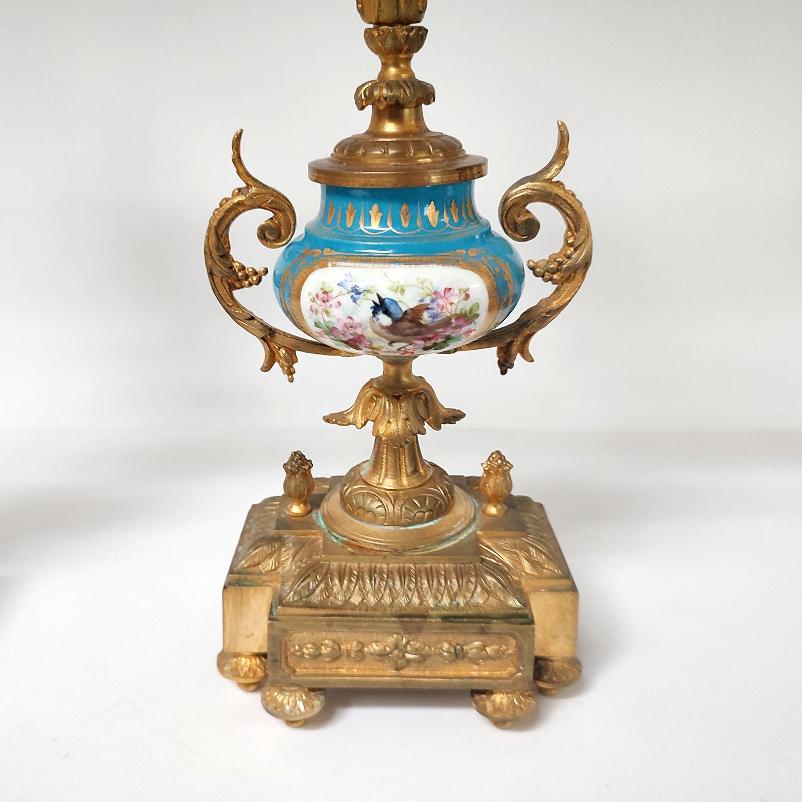 French Ormolu and Porcelain Mantle Clock and Pair of Candelabra, 19th Century 8