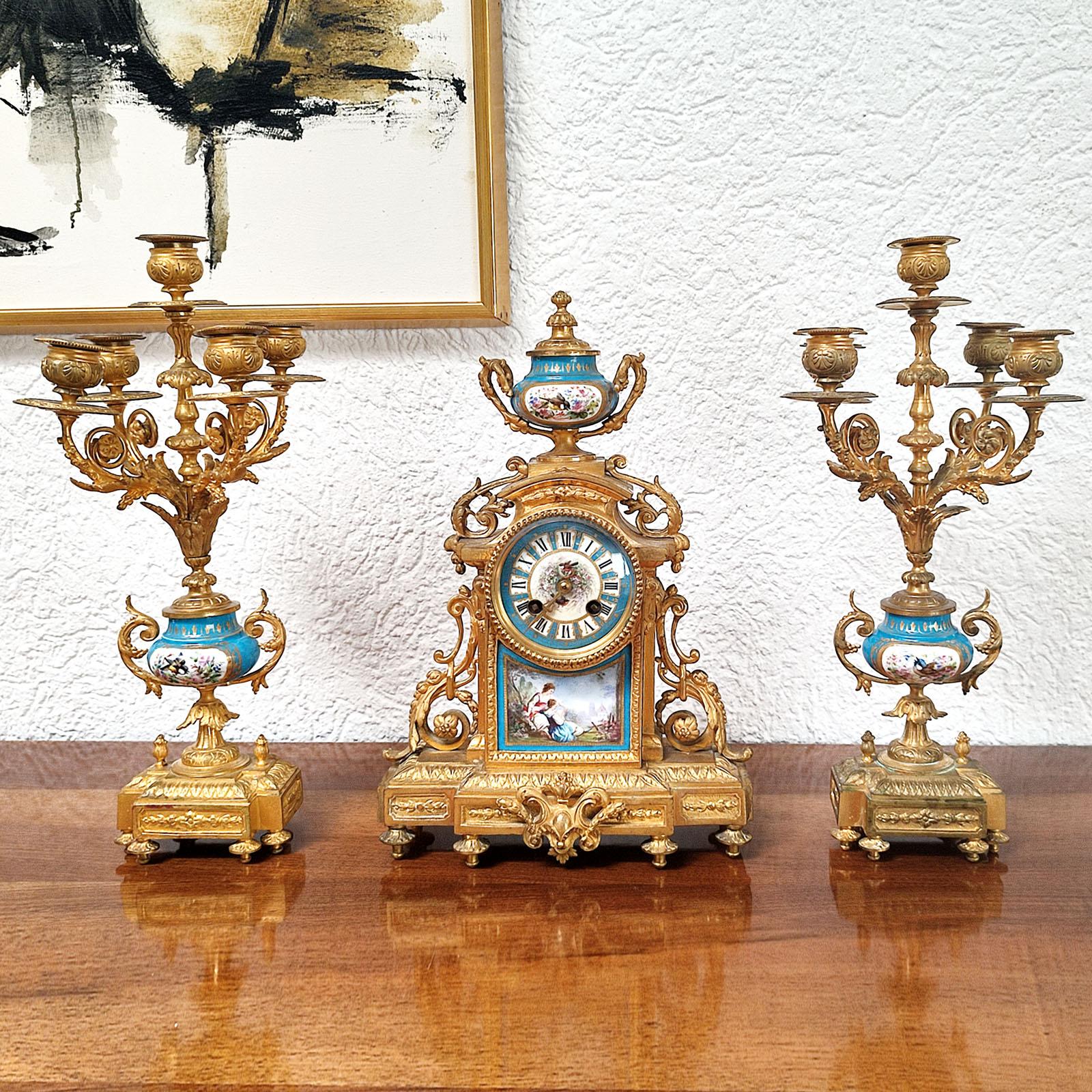 Louis XVI French Ormolu and Porcelain Mantle Clock and Pair of Candelabra, 19th Century