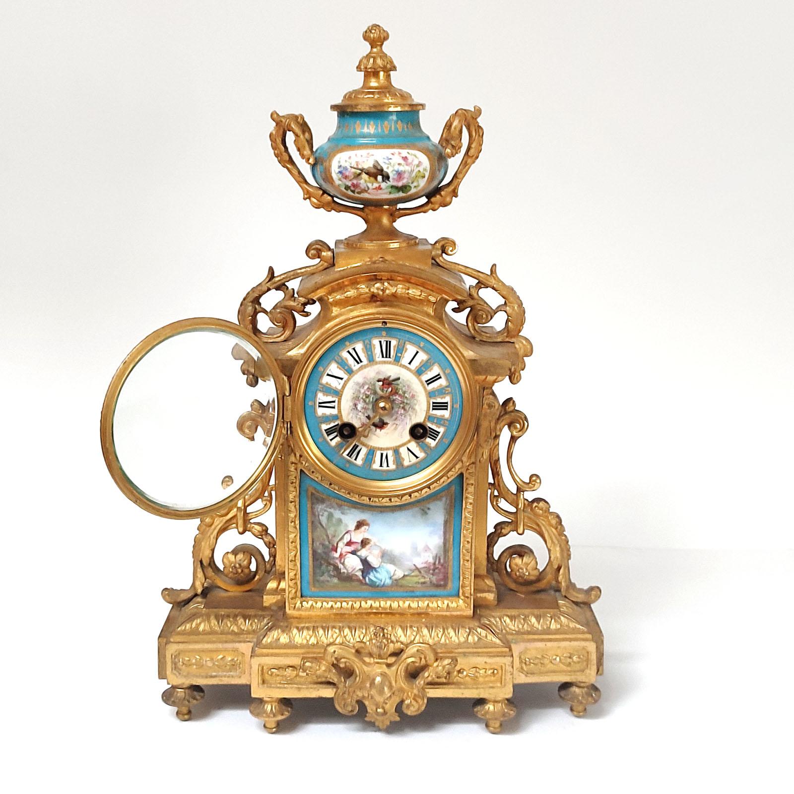 Late 19th Century French Ormolu and Porcelain Mantle Clock and Pair of Candelabra, 19th Century