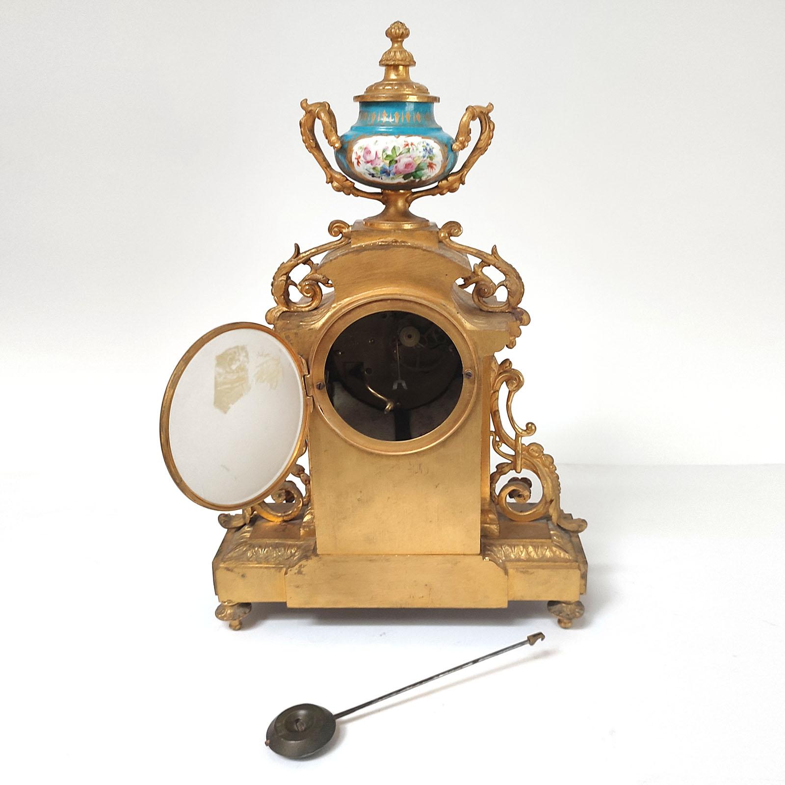 French Ormolu and Porcelain Mantle Clock and Pair of Candelabra, 19th Century 2