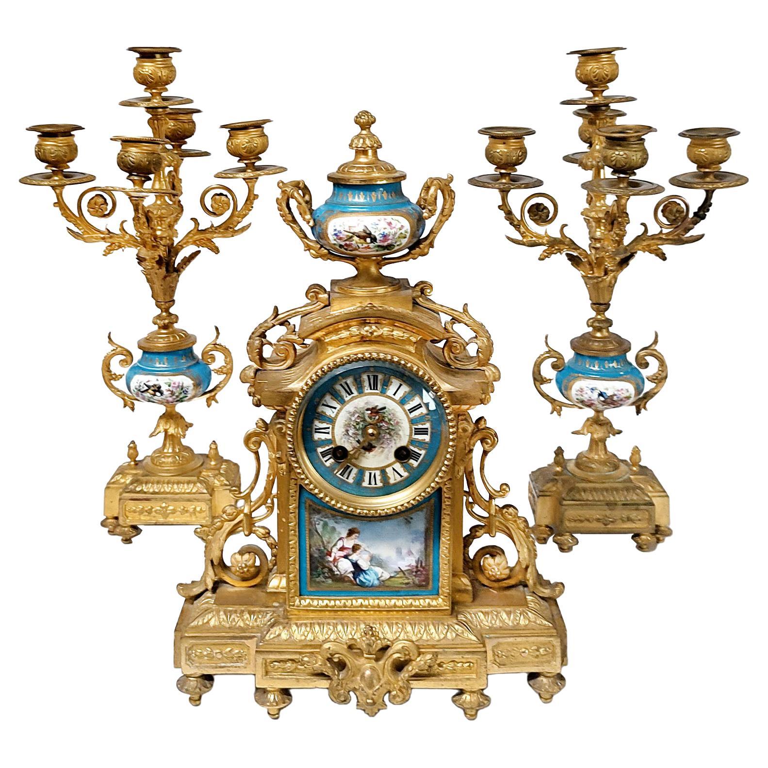 French Ormolu and Porcelain Mantle Clock and Pair of Candelabra, 19th Century