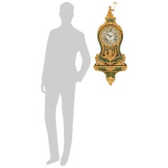 French Ormolu and stained Horn Cartel clock, signed Faucheur à Paris, circa 1750