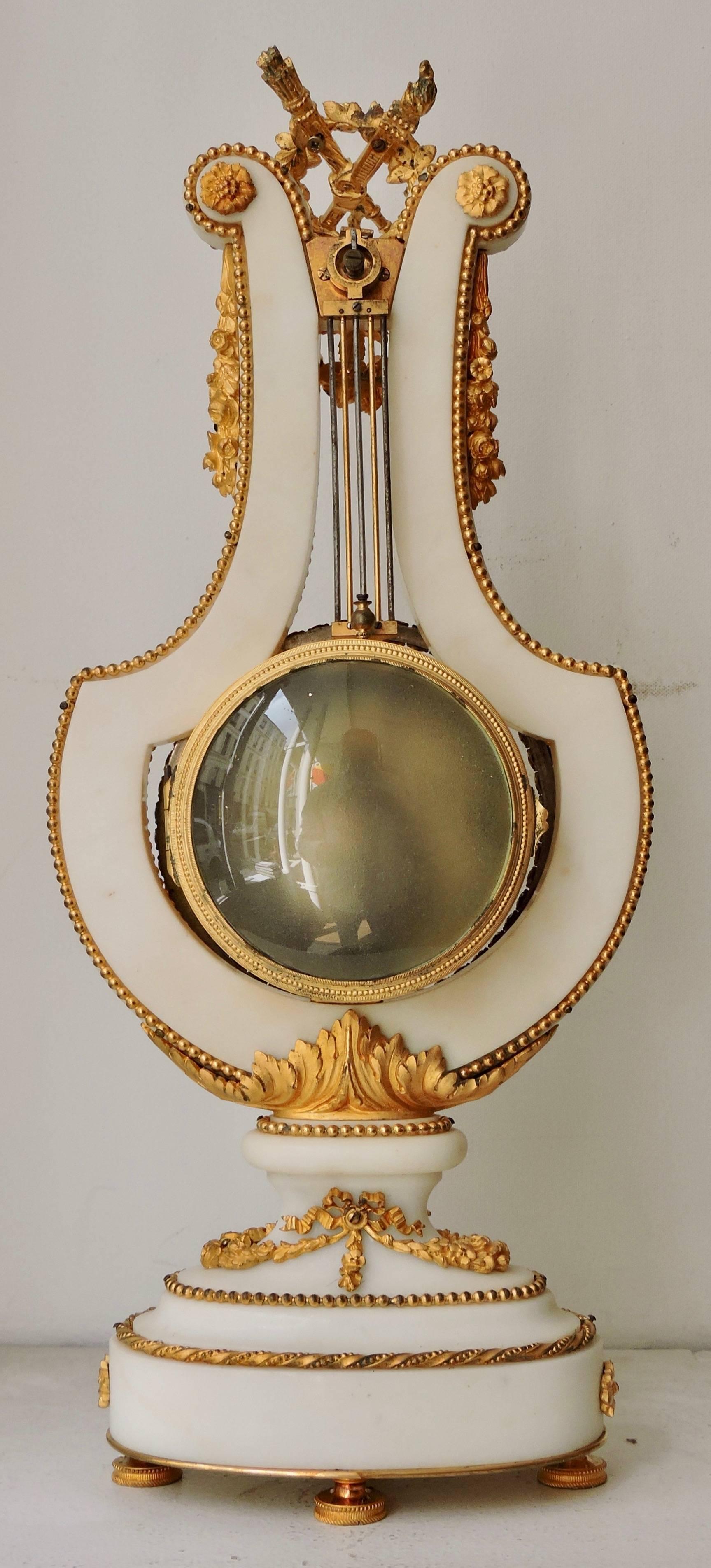 French Ormolu and White Marble Three-Piece Lyre Shaped Clock Garniture 4