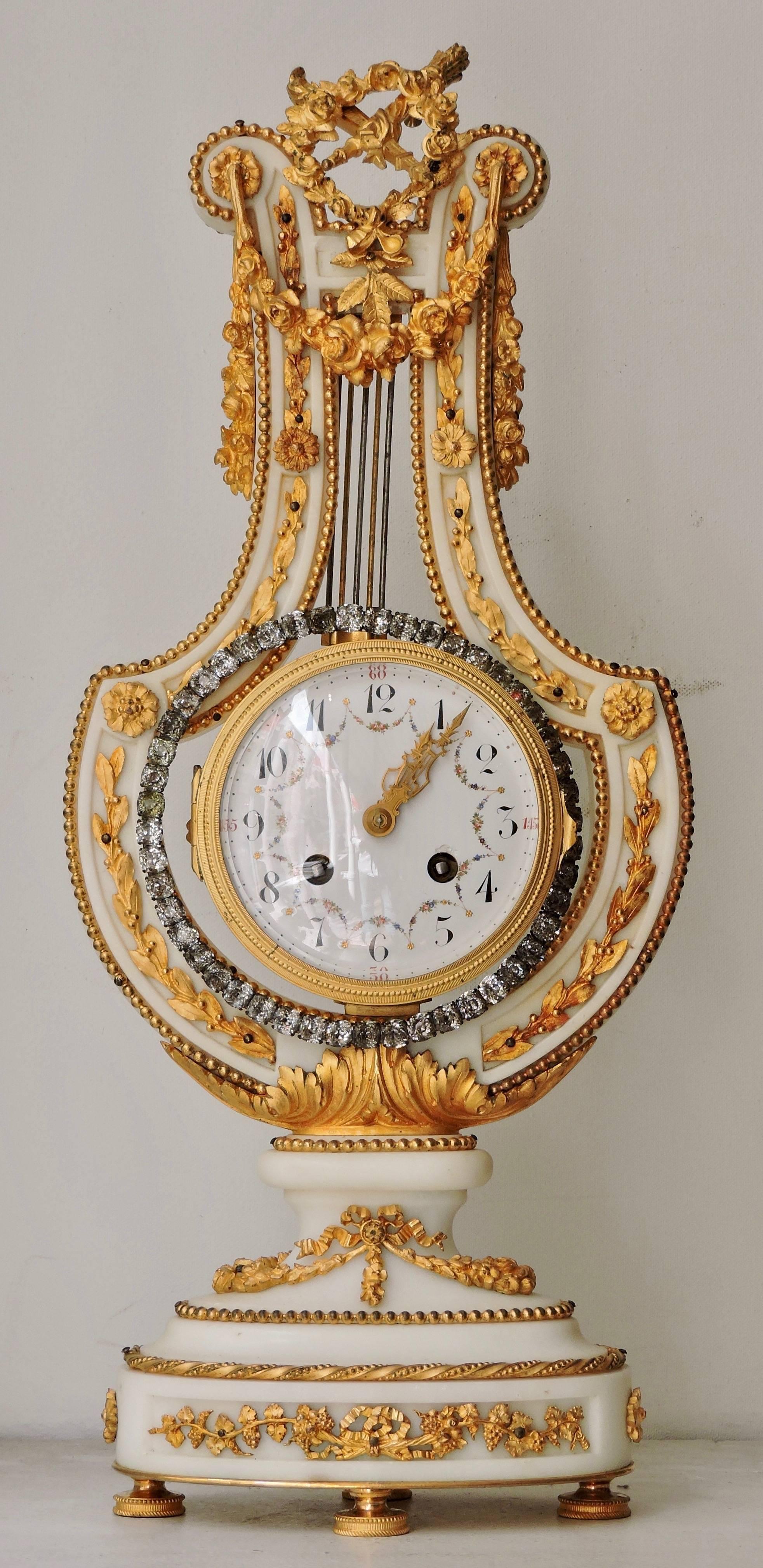 French Ormolu and White Marble Three-Piece Lyre Shaped Clock Garniture In Good Condition In Saint-Ouen, FR