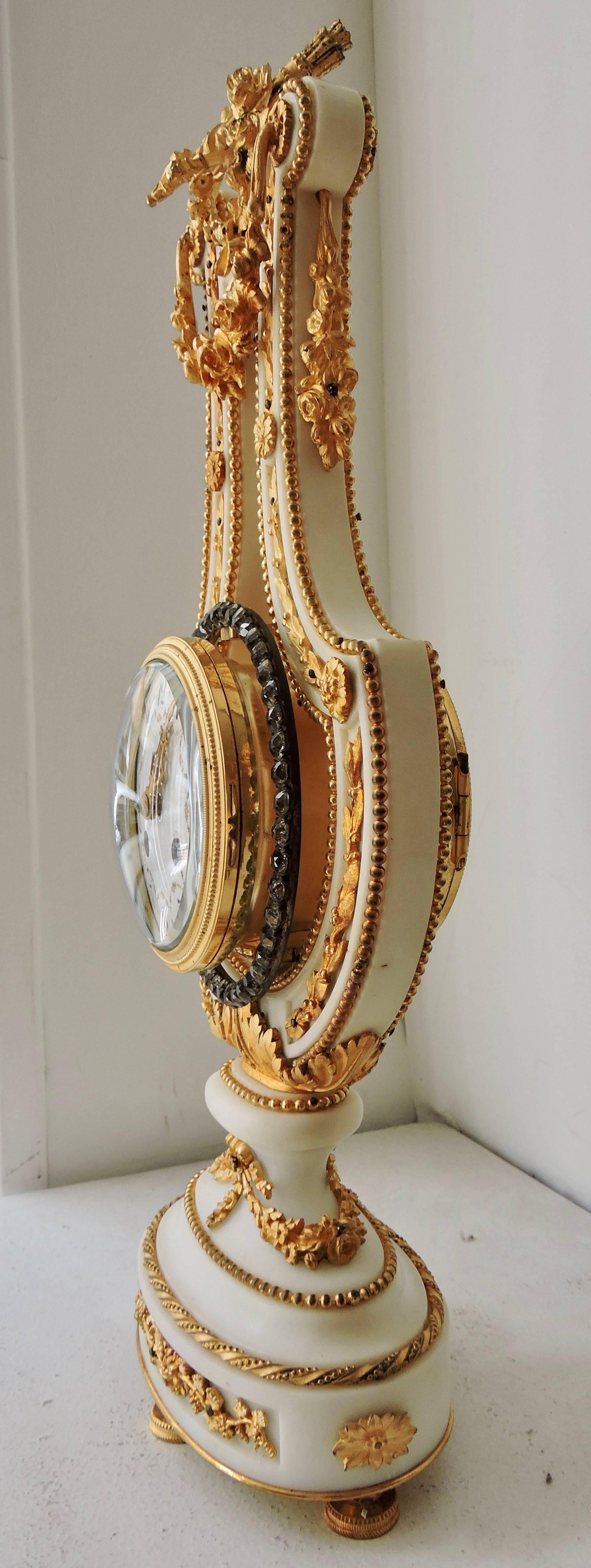 Late 19th Century French Ormolu and White Marble Three-Piece Lyre Shaped Clock Garniture