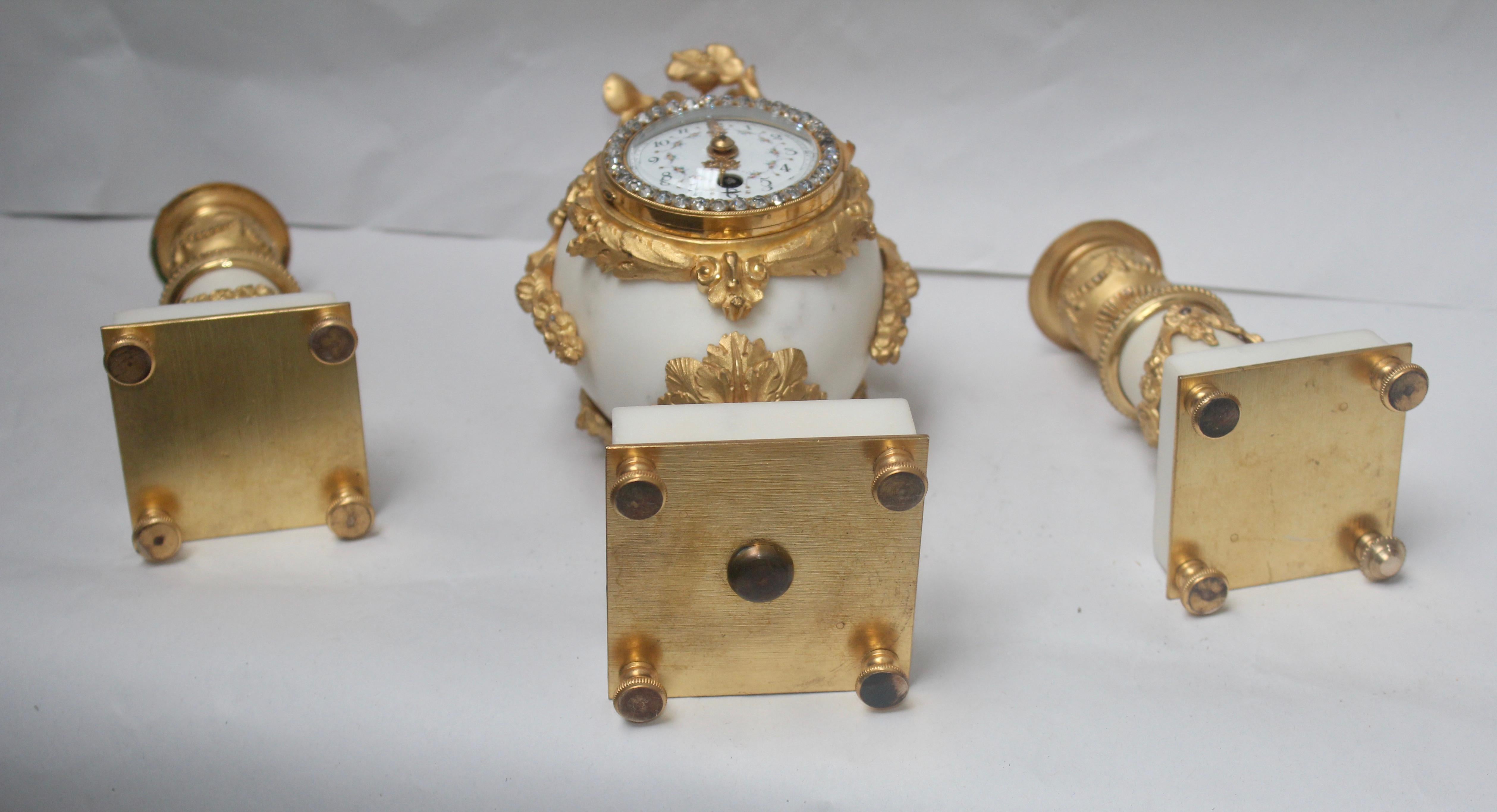 French Ormolu and White Marble Three-Pieces Vase Shaped Clock Garniture 7