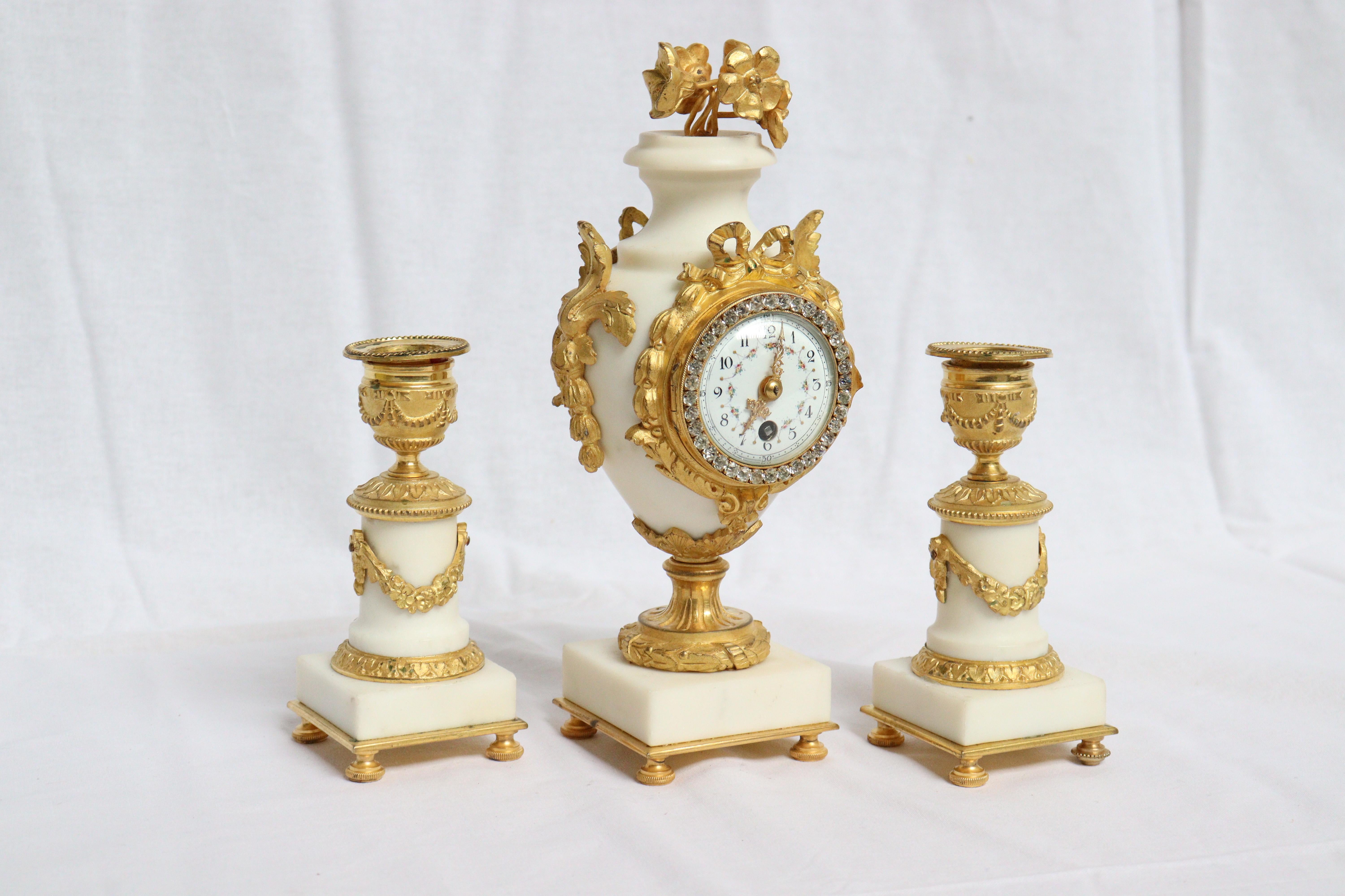 French Ormolu and White Marble Three-Pieces Vase Shaped Clock Garniture 9