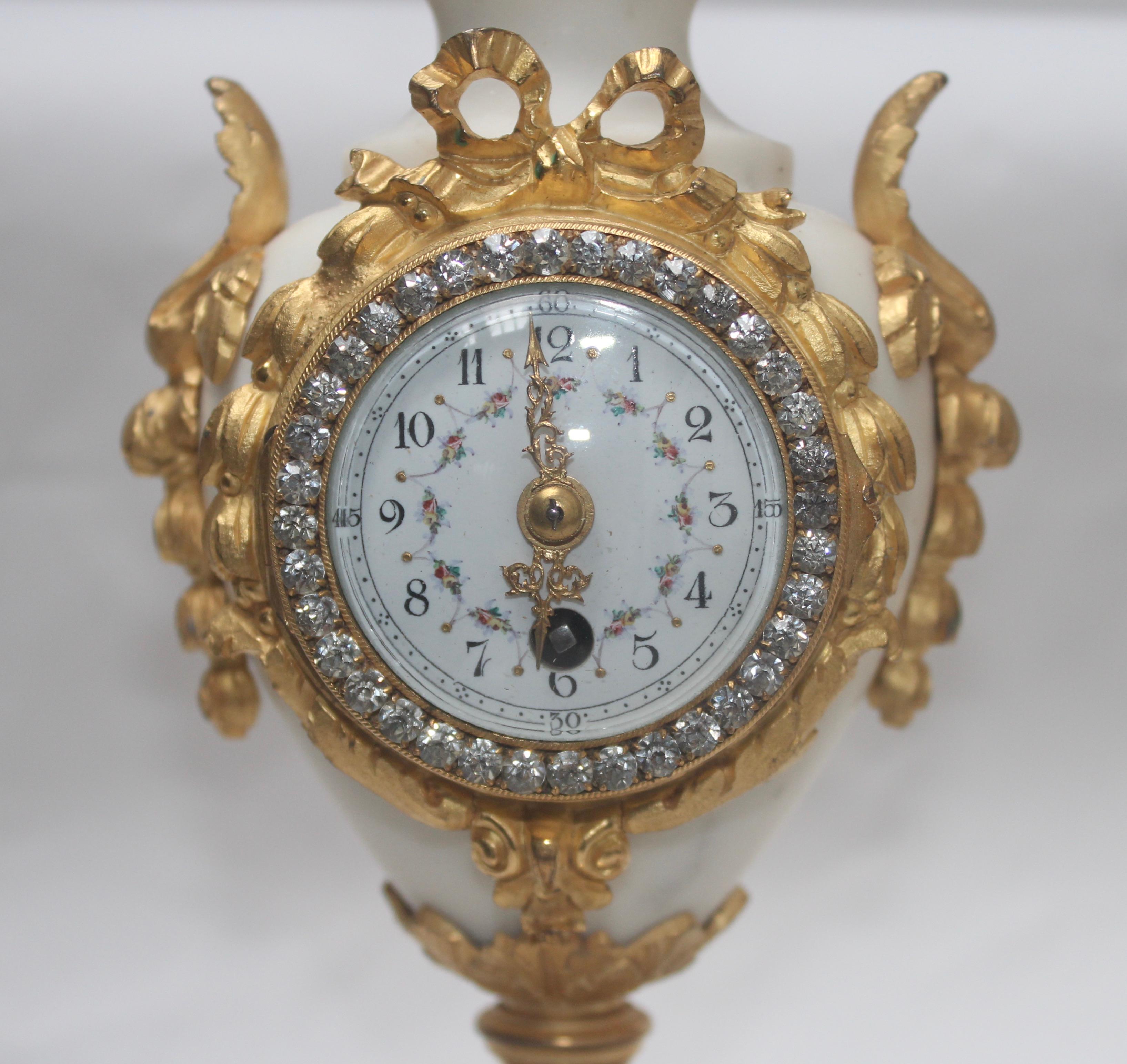 French Ormolu and White Marble Three-Pieces Vase Shaped Clock Garniture 2
