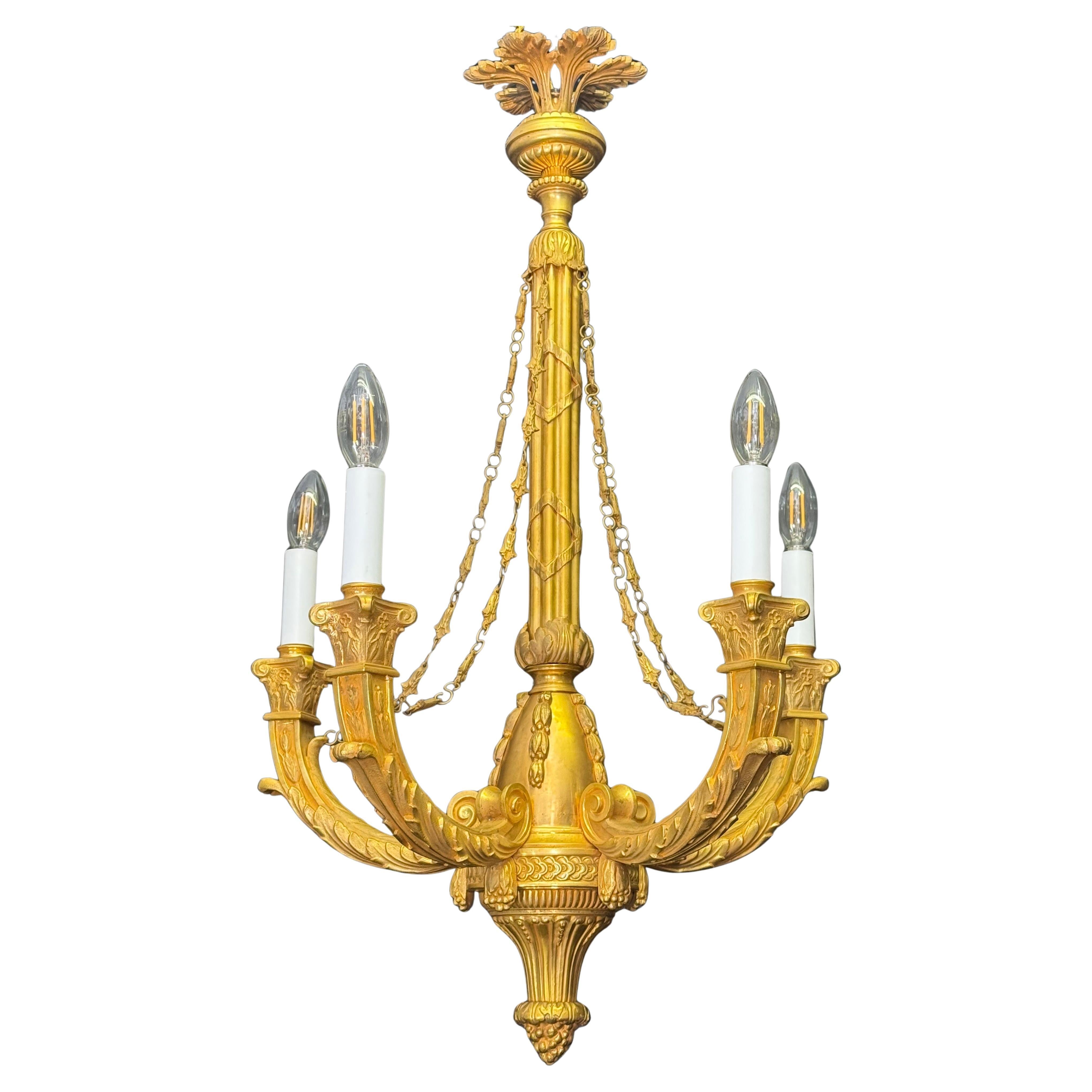 Lampadario francese in stile impero in bronzo ormolinato, anni
60 ca.