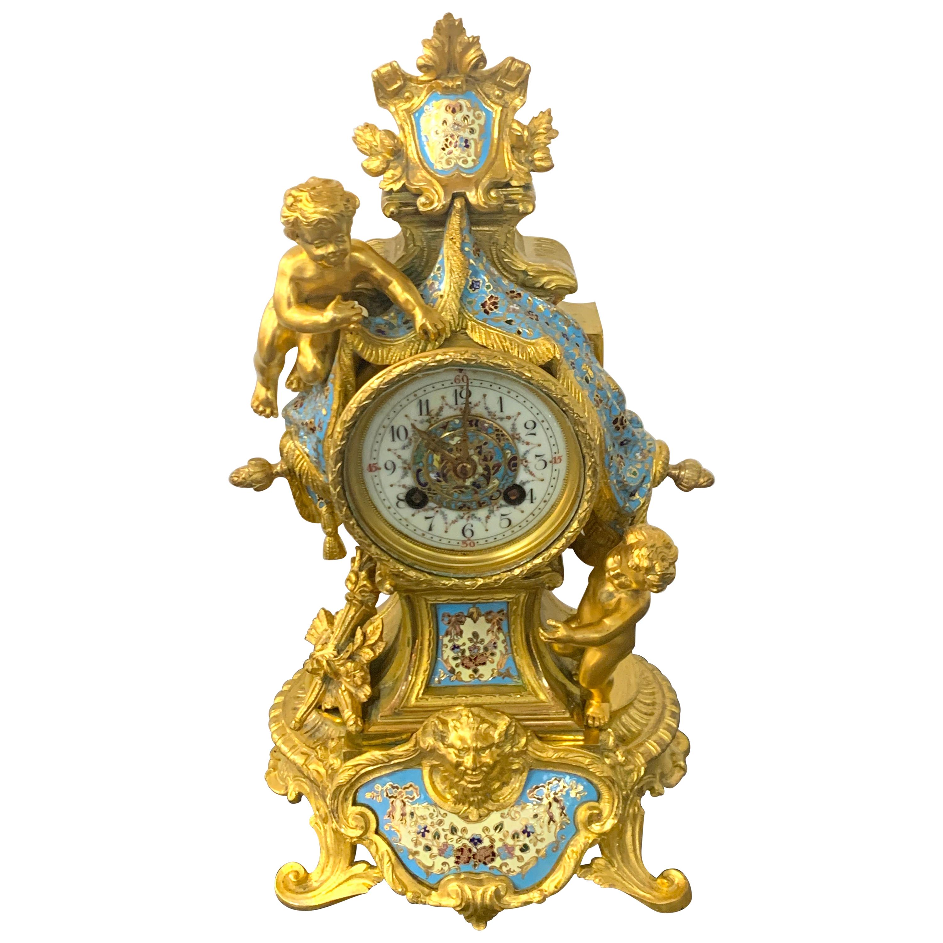 French Ormolu & Champlevé Enamel Draped Putti Motif Clock, Paris, 1890s For Sale