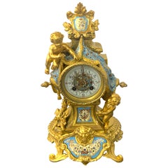 French Ormolu & Champlevé Enamel Draped Putti Motif Clock, Paris, 1890s