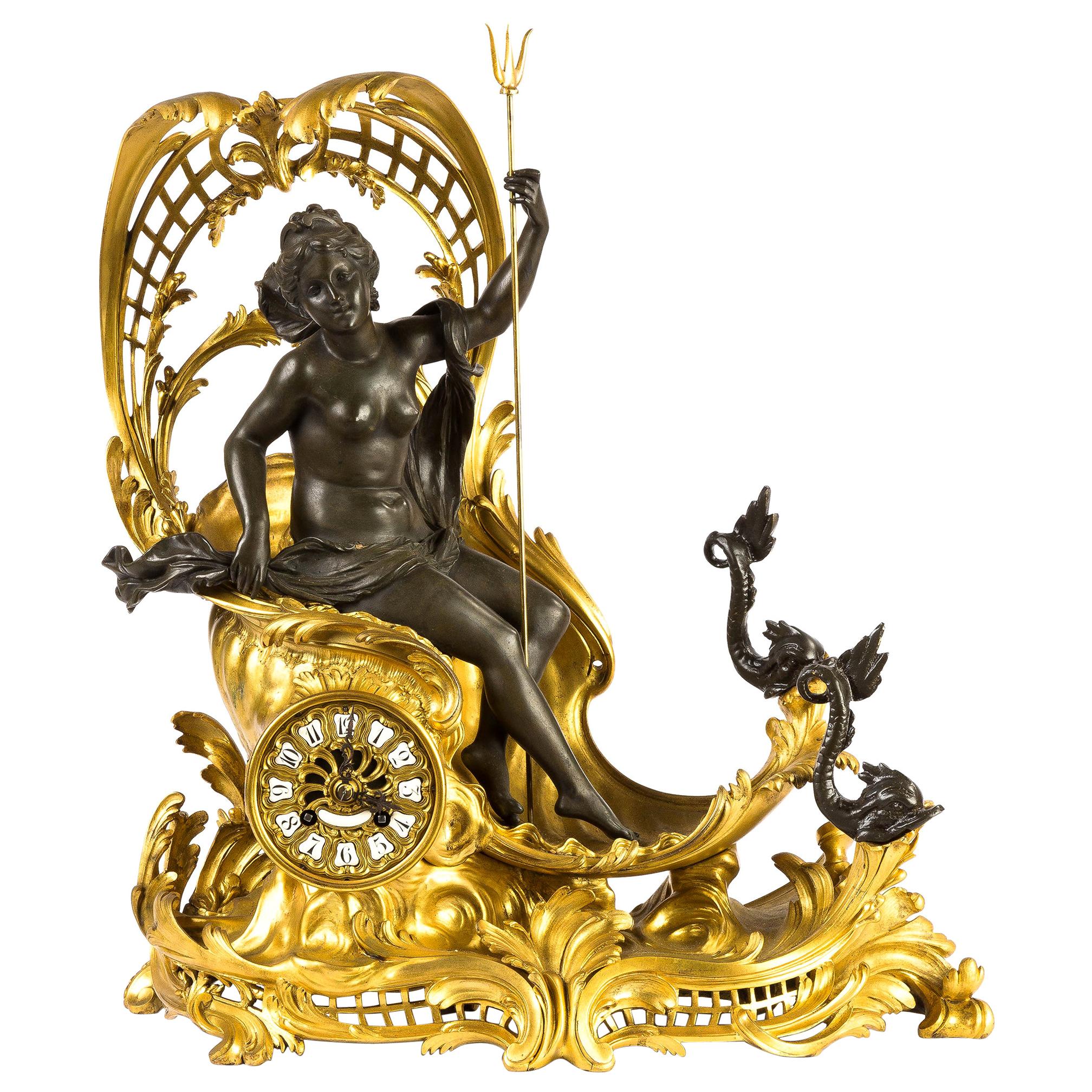 Pendule de cheminée en bronze doré représentant le char d'Amphitrite en vente