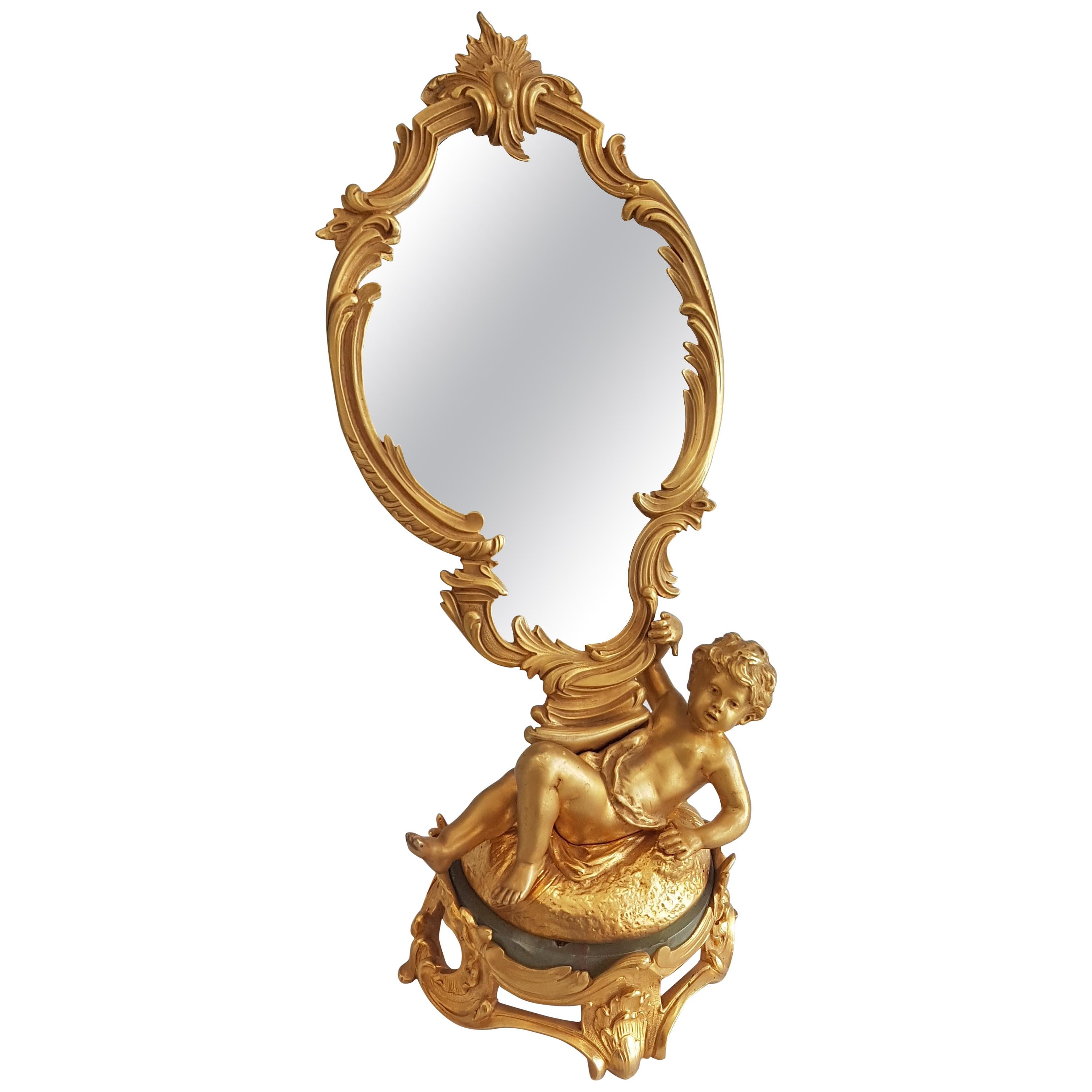 Miroir figuratif en bronze doré français signé August Moreau en vente