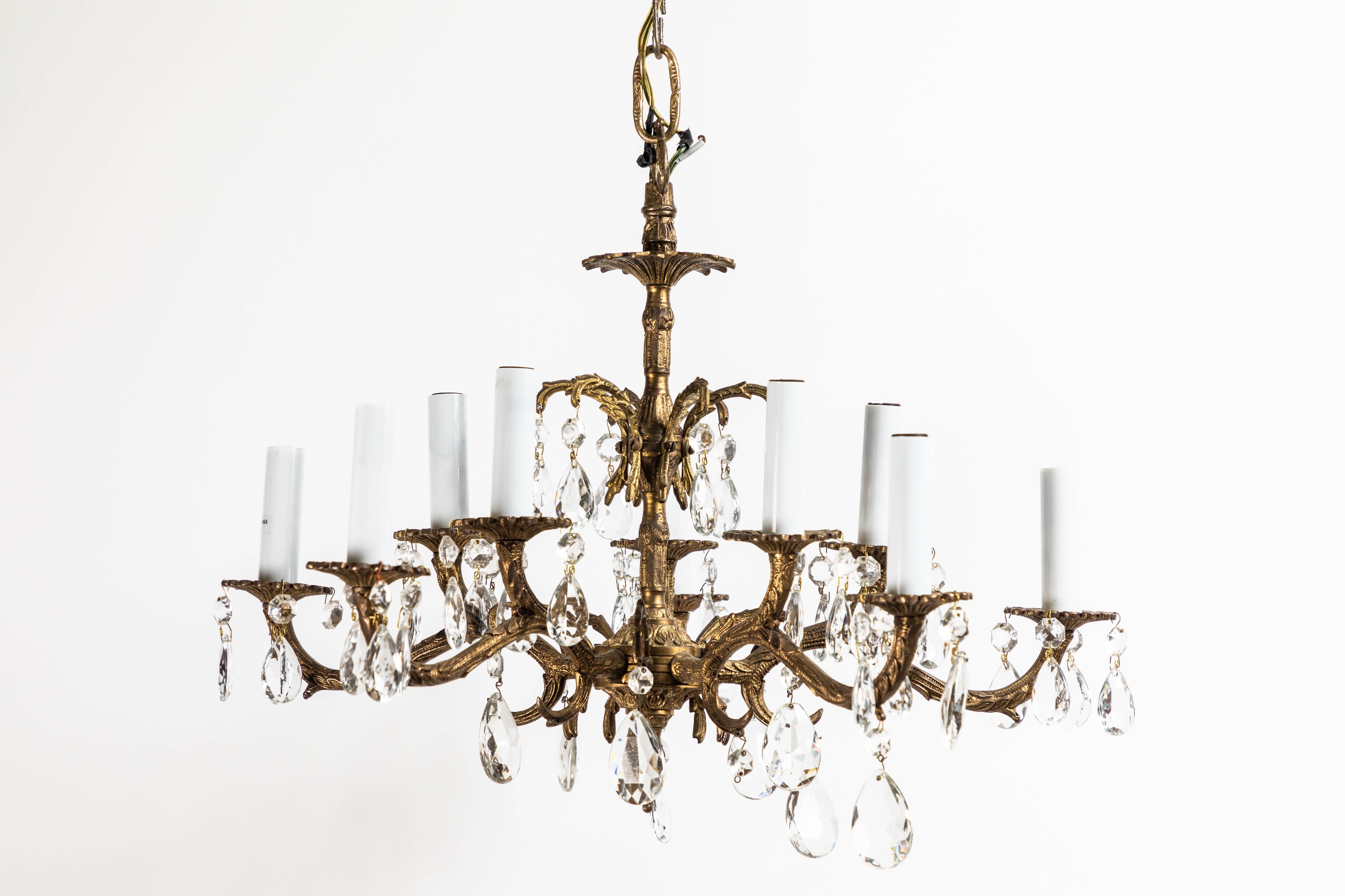Stately 10-light French Belle Époque style ormolu gilded bronze and crystal chandelier with shades and decorative bronze canopy. 20th century, wired for USA. Measures: 12